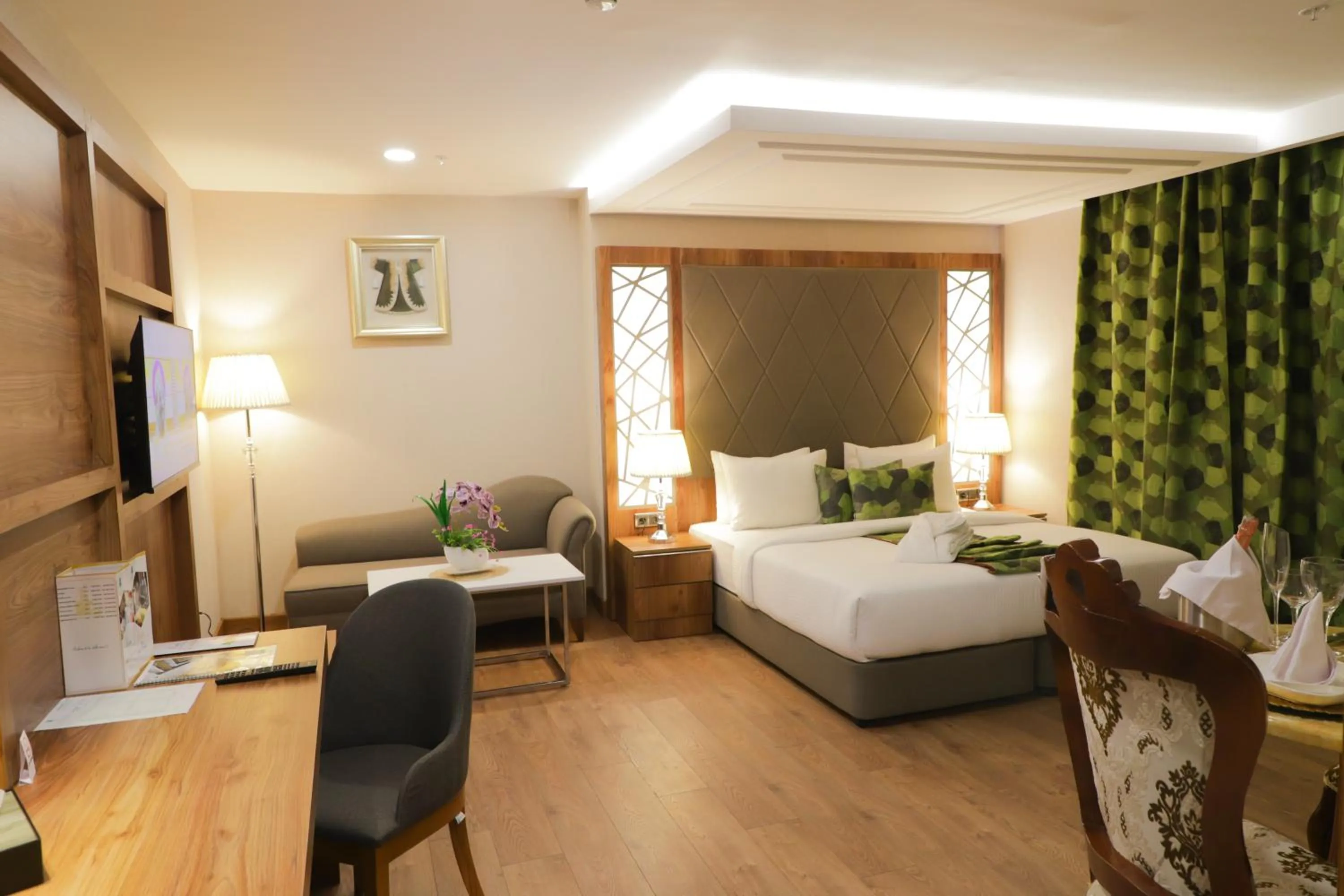 Bed in UNITED HOTEL INTERNATIONAL