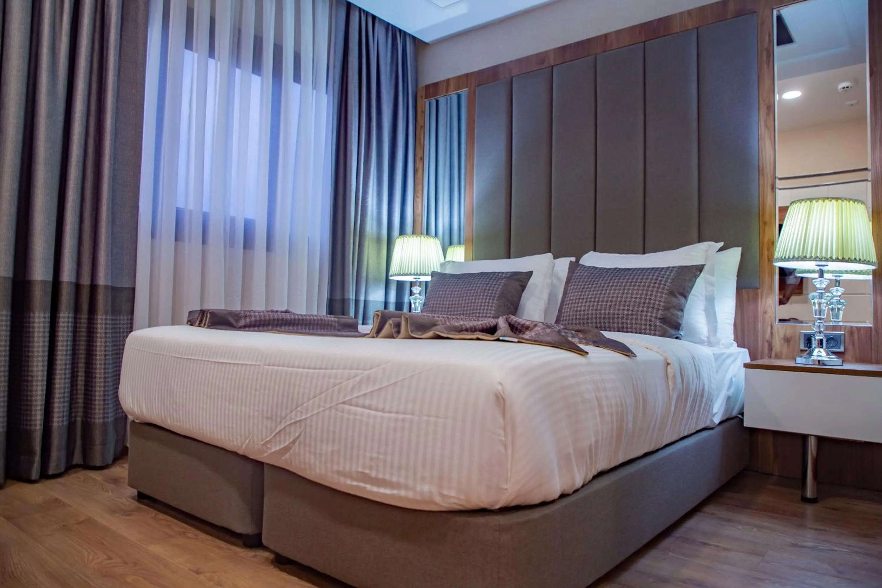 Bed in UNITED HOTEL INTERNATIONAL