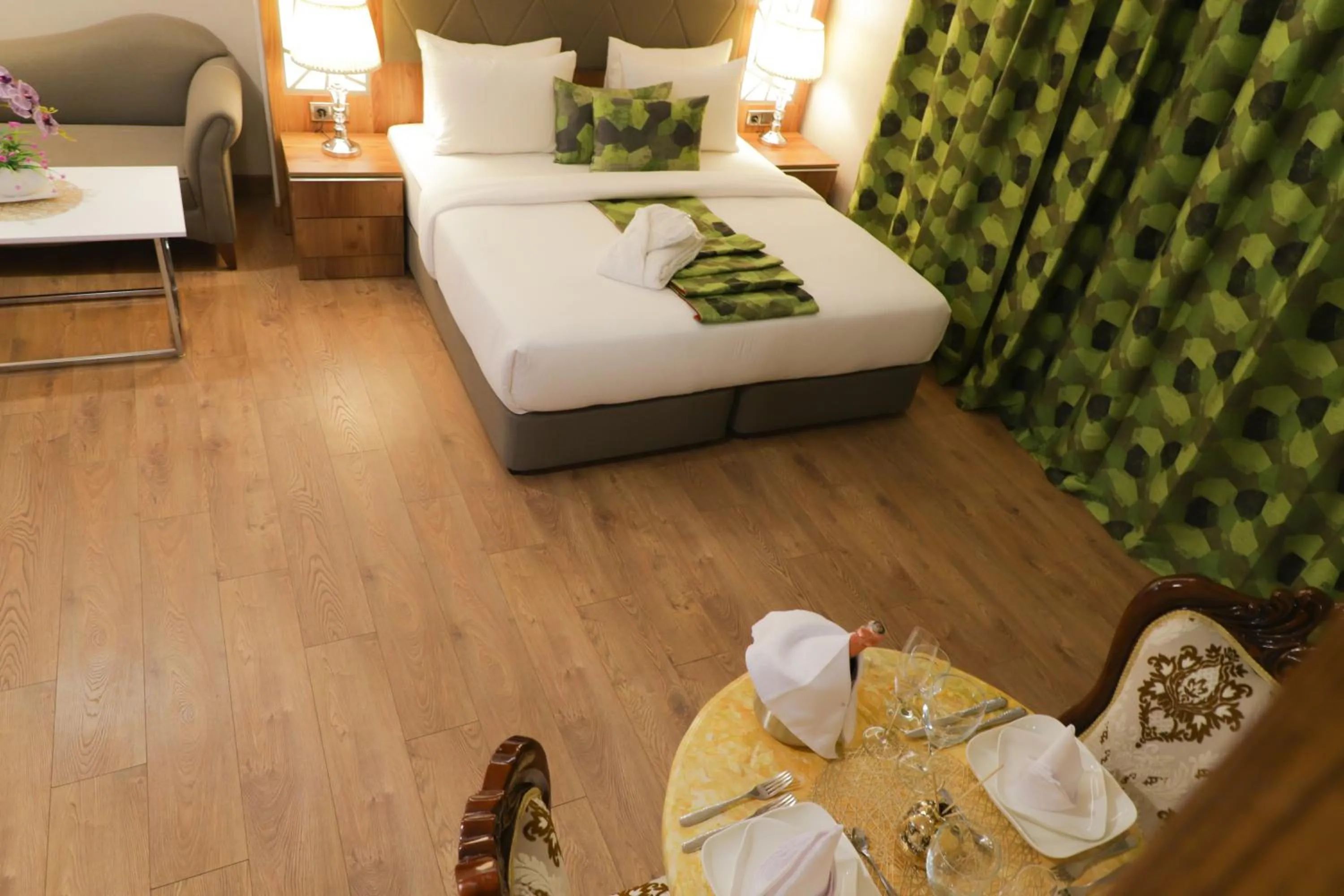 Bed in UNITED HOTEL INTERNATIONAL