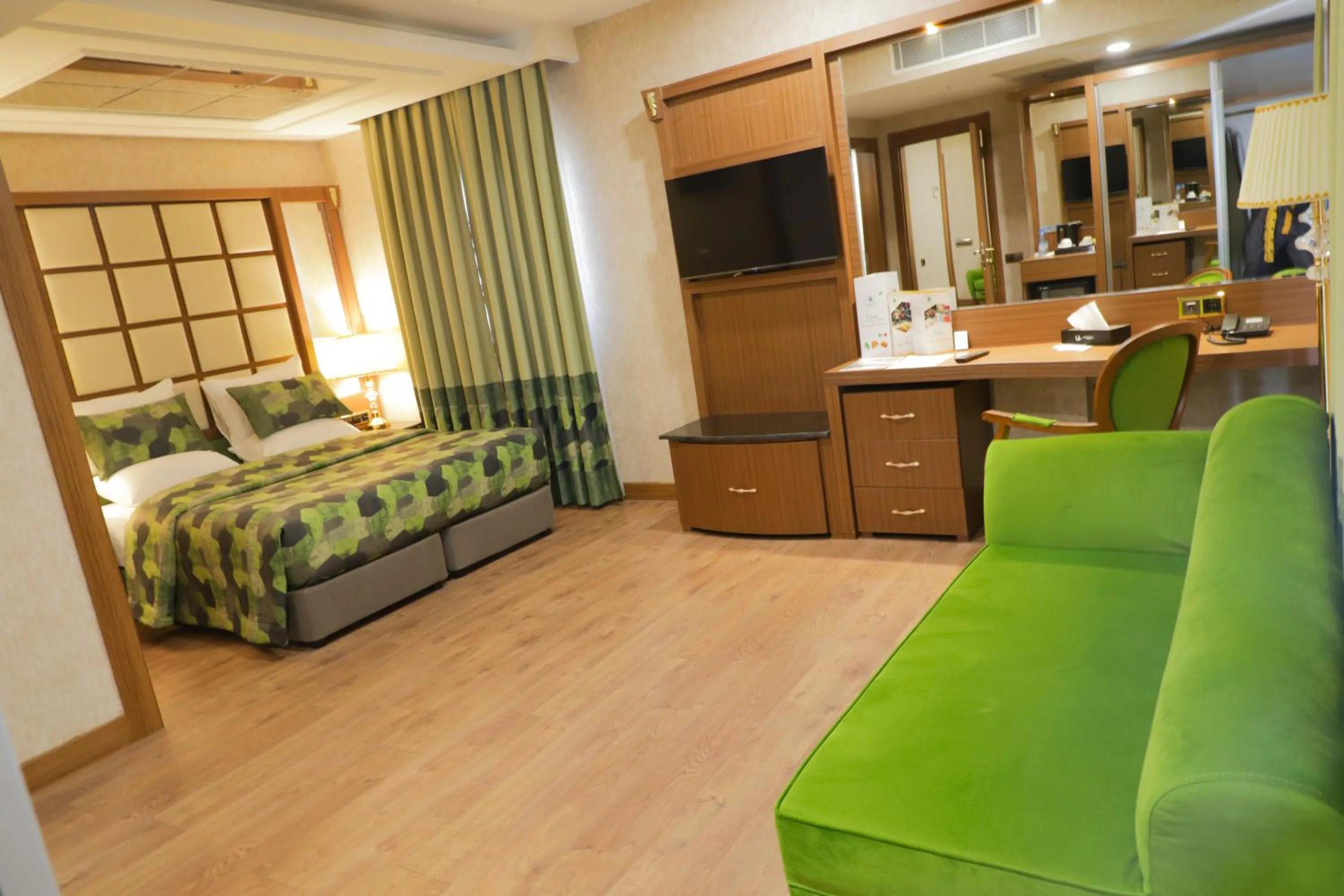 Bed in UNITED HOTEL INTERNATIONAL