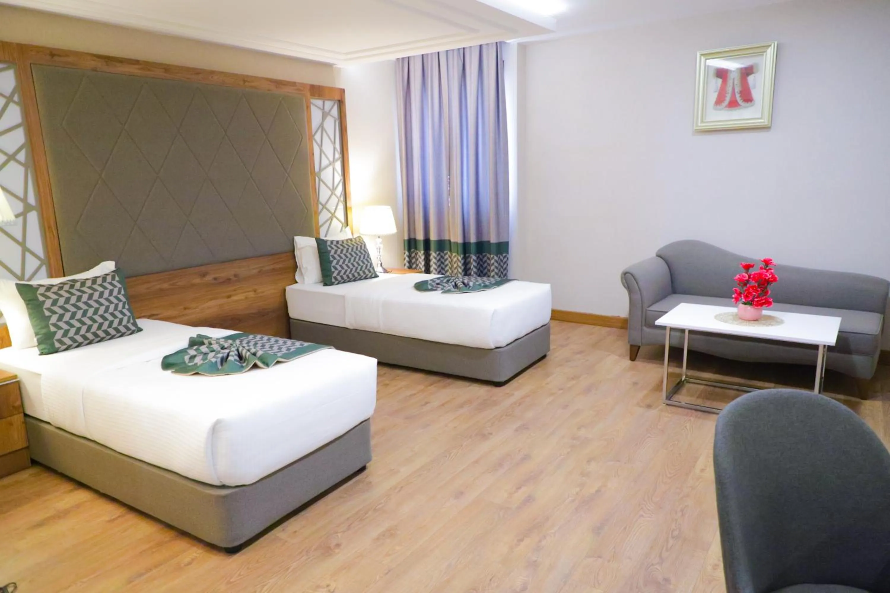 Bed in UNITED HOTEL INTERNATIONAL