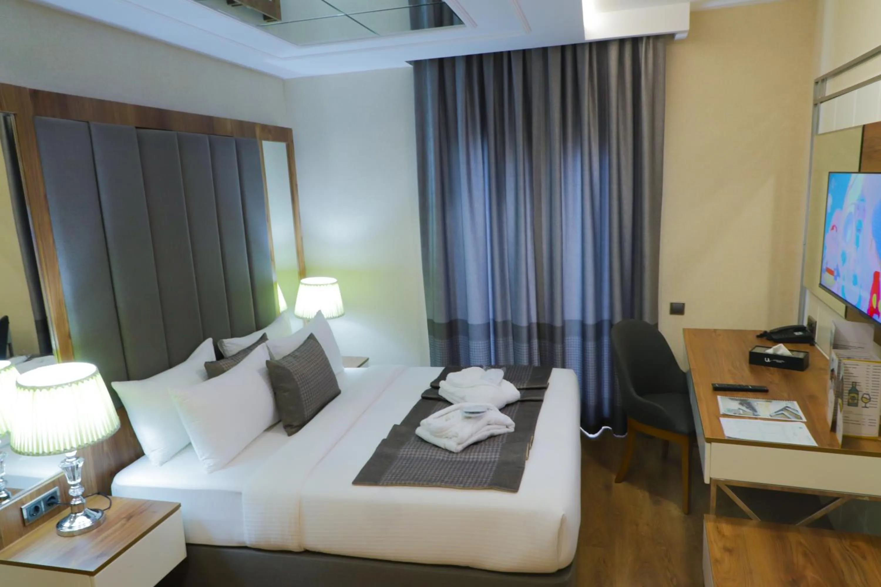 Bed in UNITED HOTEL INTERNATIONAL