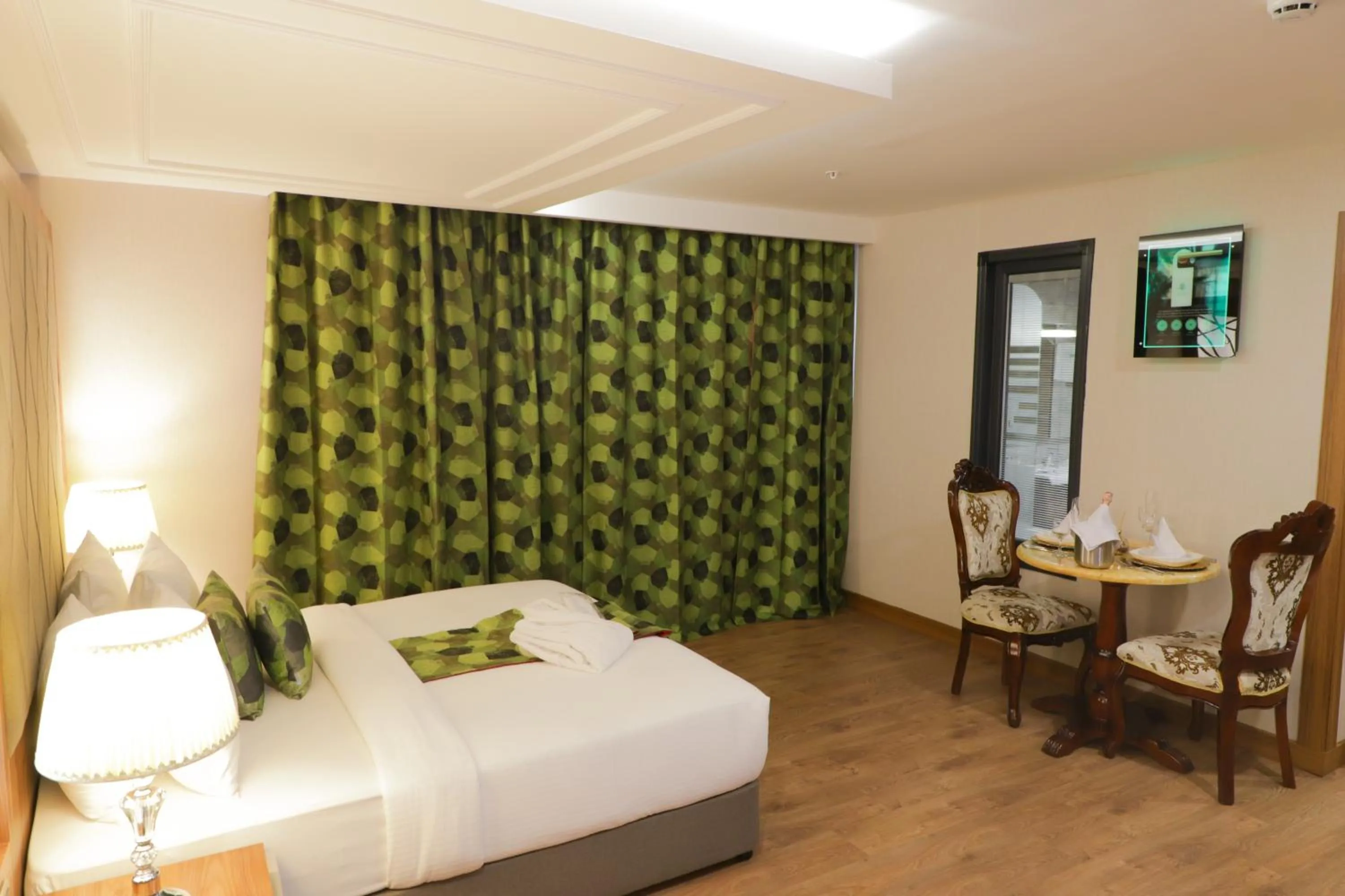 Bed in UNITED HOTEL INTERNATIONAL