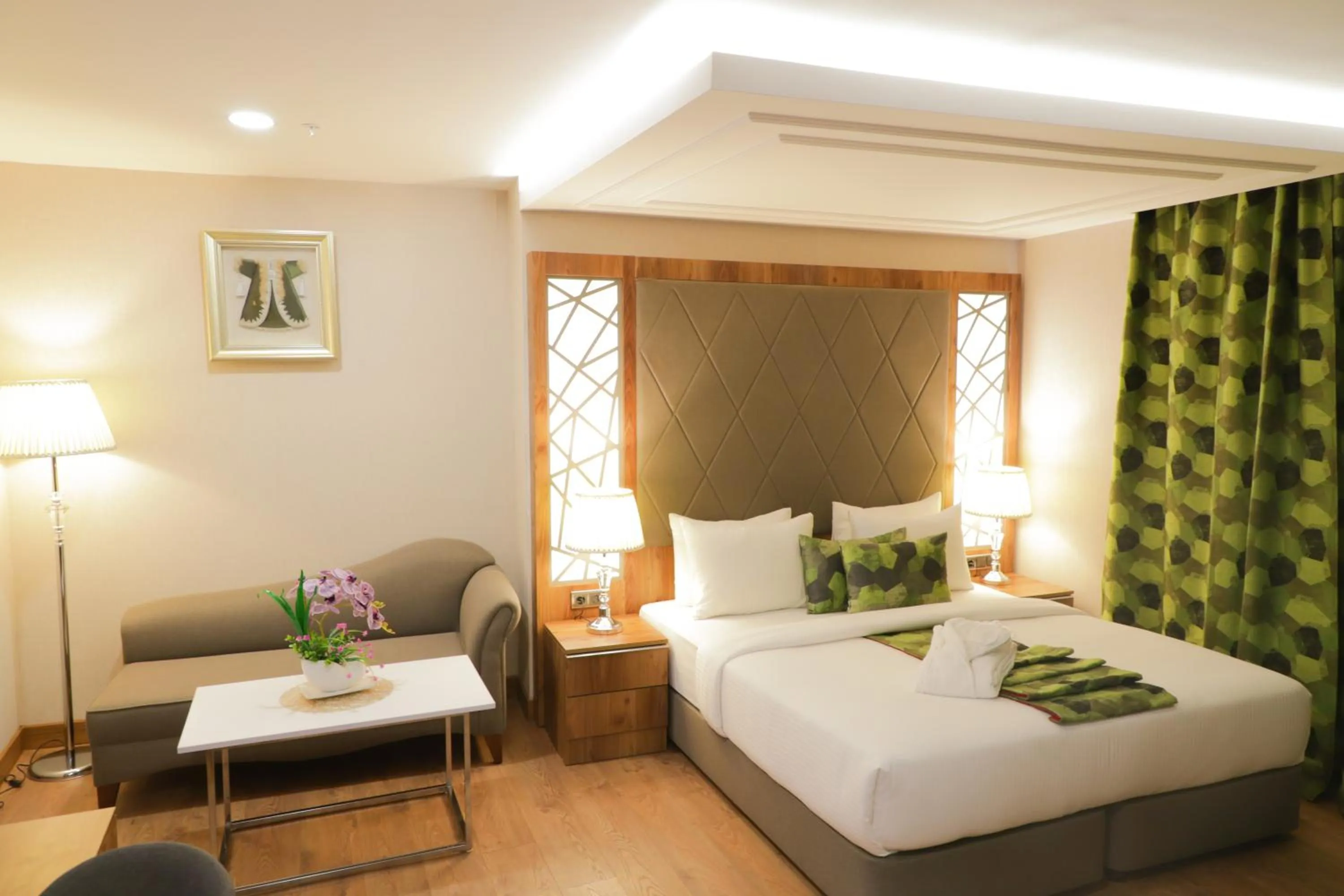 Bed in UNITED HOTEL INTERNATIONAL