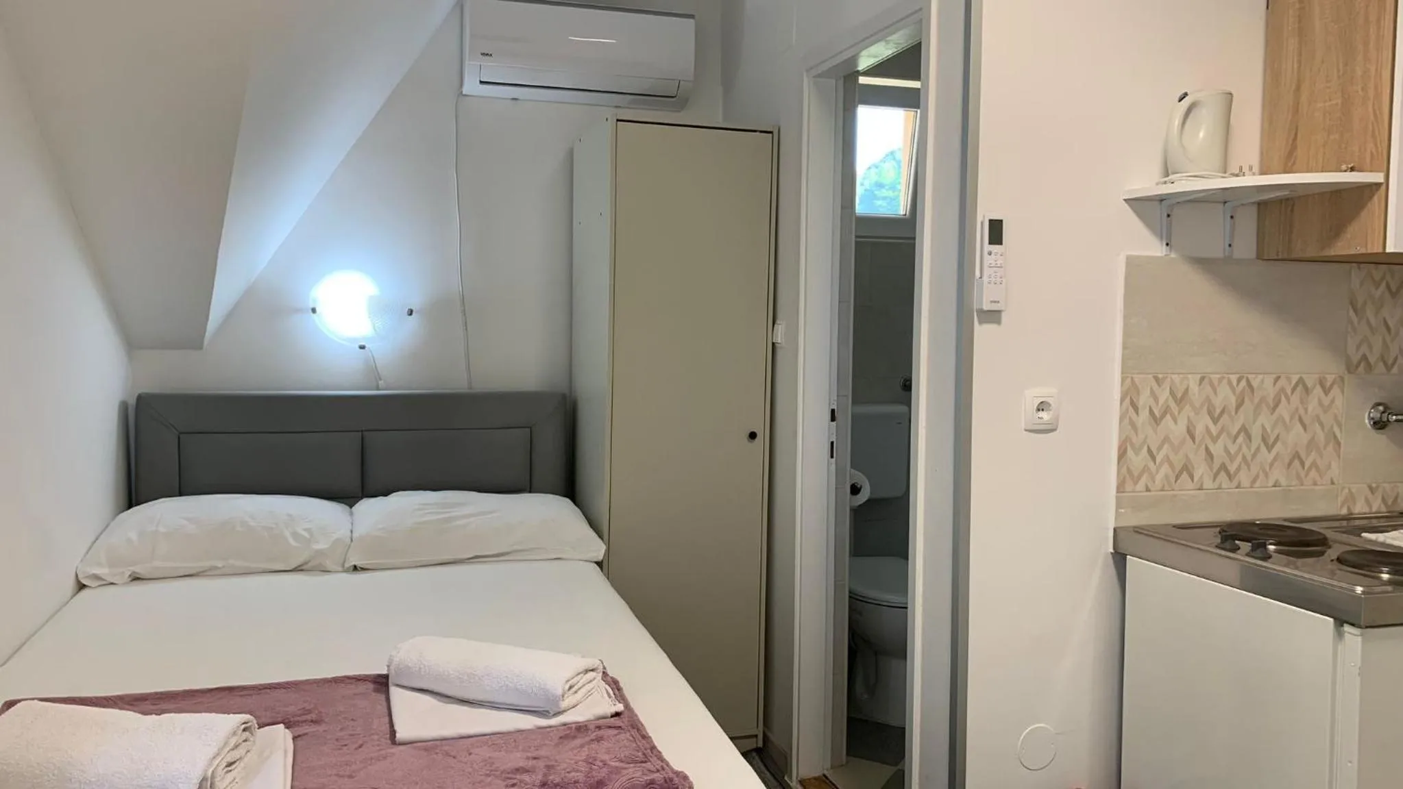 Bed in Apartmani i sobe Đurđan