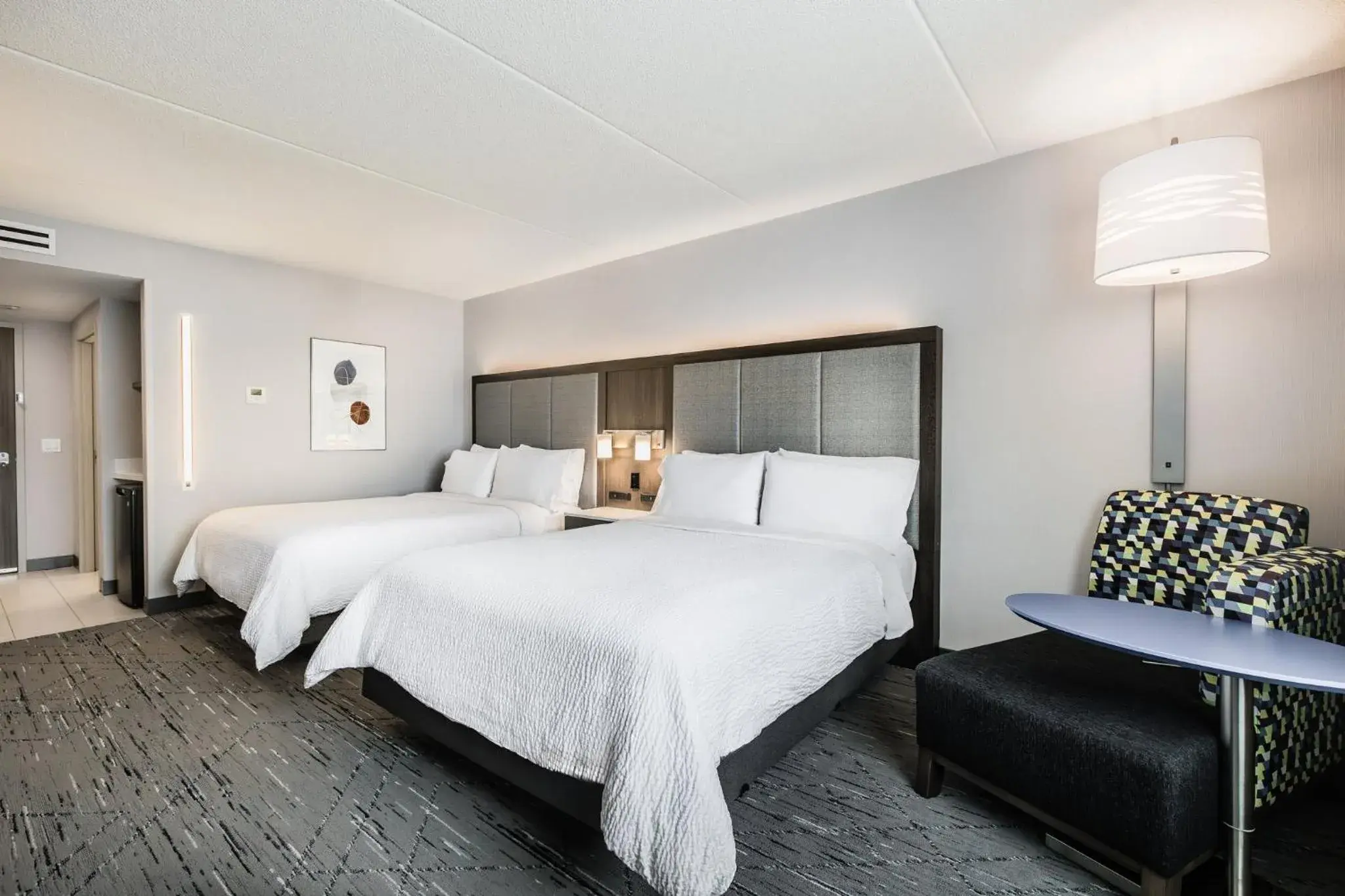 Photo of the whole room, Bed in Holiday Inn Express & Suites Toronto Airport South by IHG Photo of the whole room, Bed in Holiday Inn Express & Suites Toronto Airport South by IHG