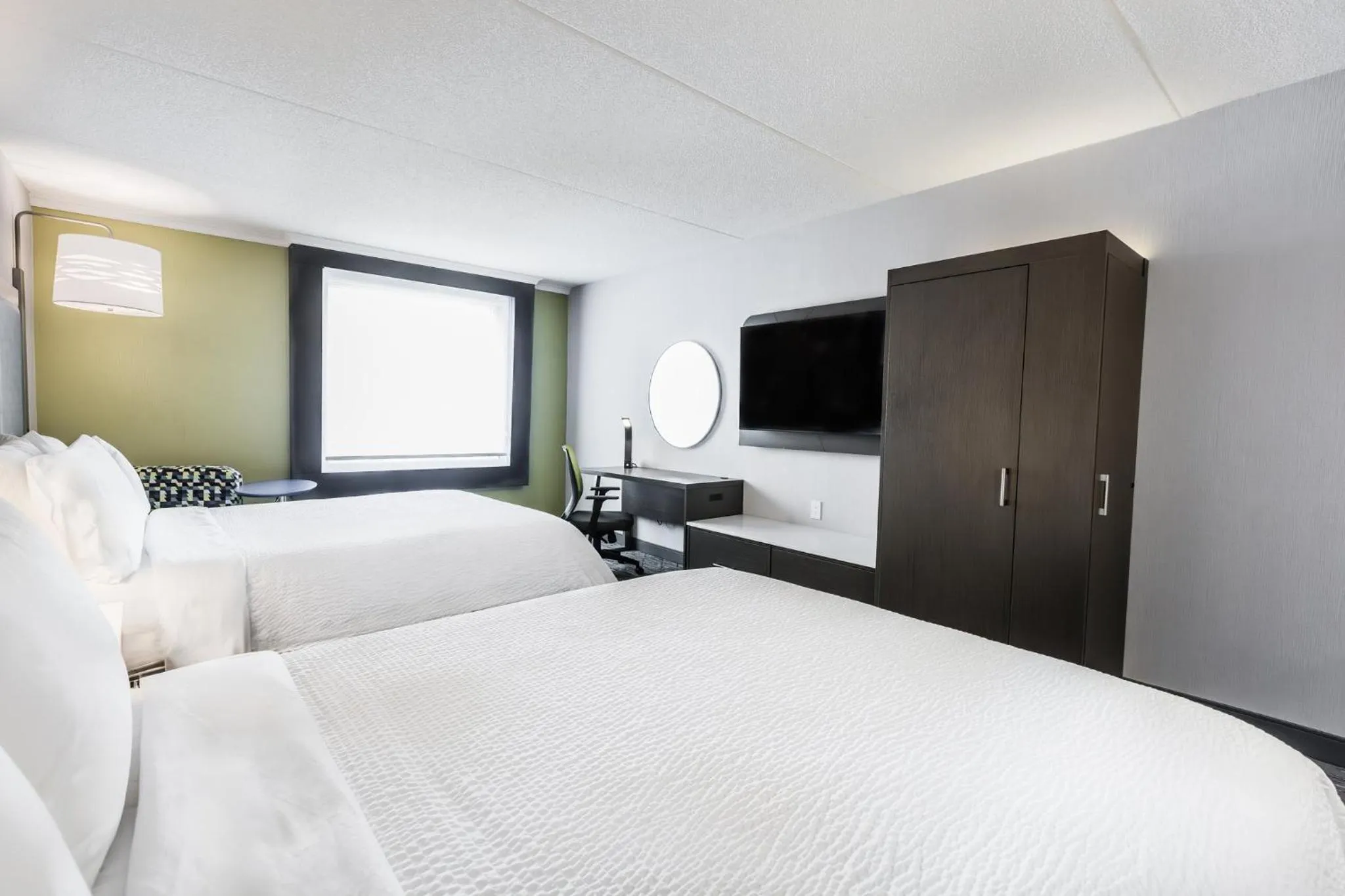 Photo of the whole room, Bed in Holiday Inn Express & Suites Toronto Airport South by IHG