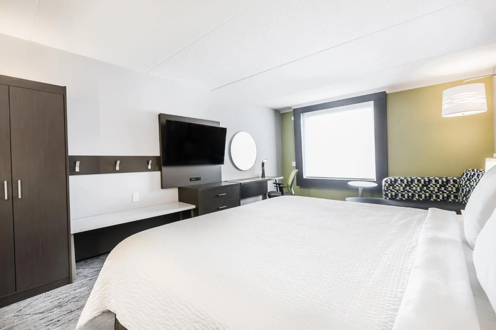 Photo of the whole room, Bed in Holiday Inn Express & Suites Toronto Airport South by IHG