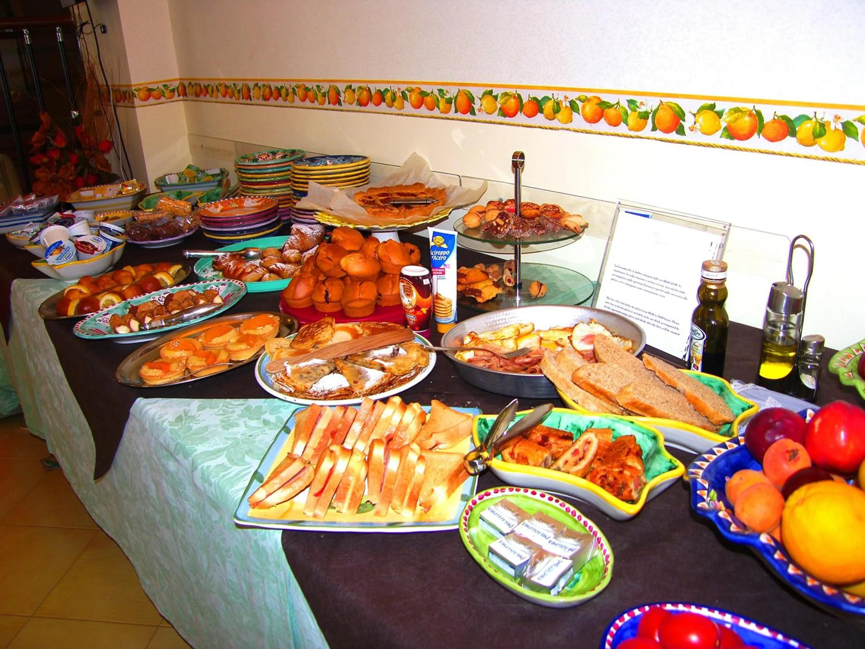 Communal lounge/ TV room in Locanda Degli Agrumi