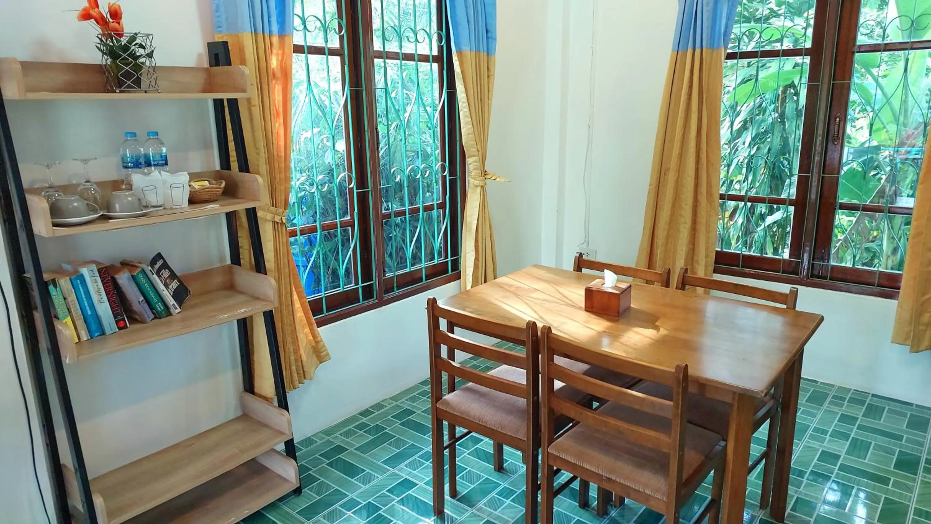 Dining area in Swiss Chalet Garden, Pool Resort