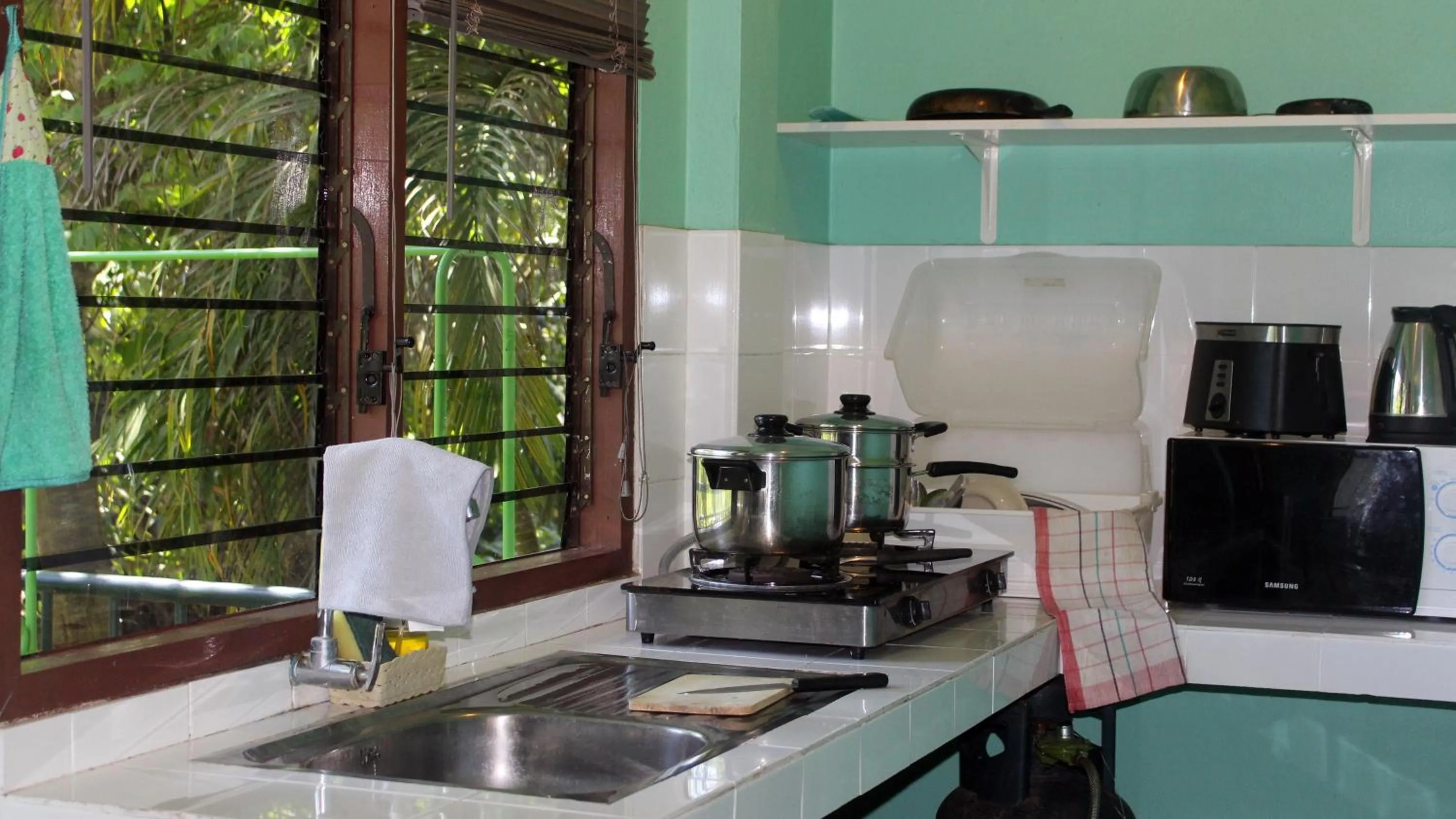 Kitchen or kitchenette in Swiss Chalet Garden, Pool Resort
