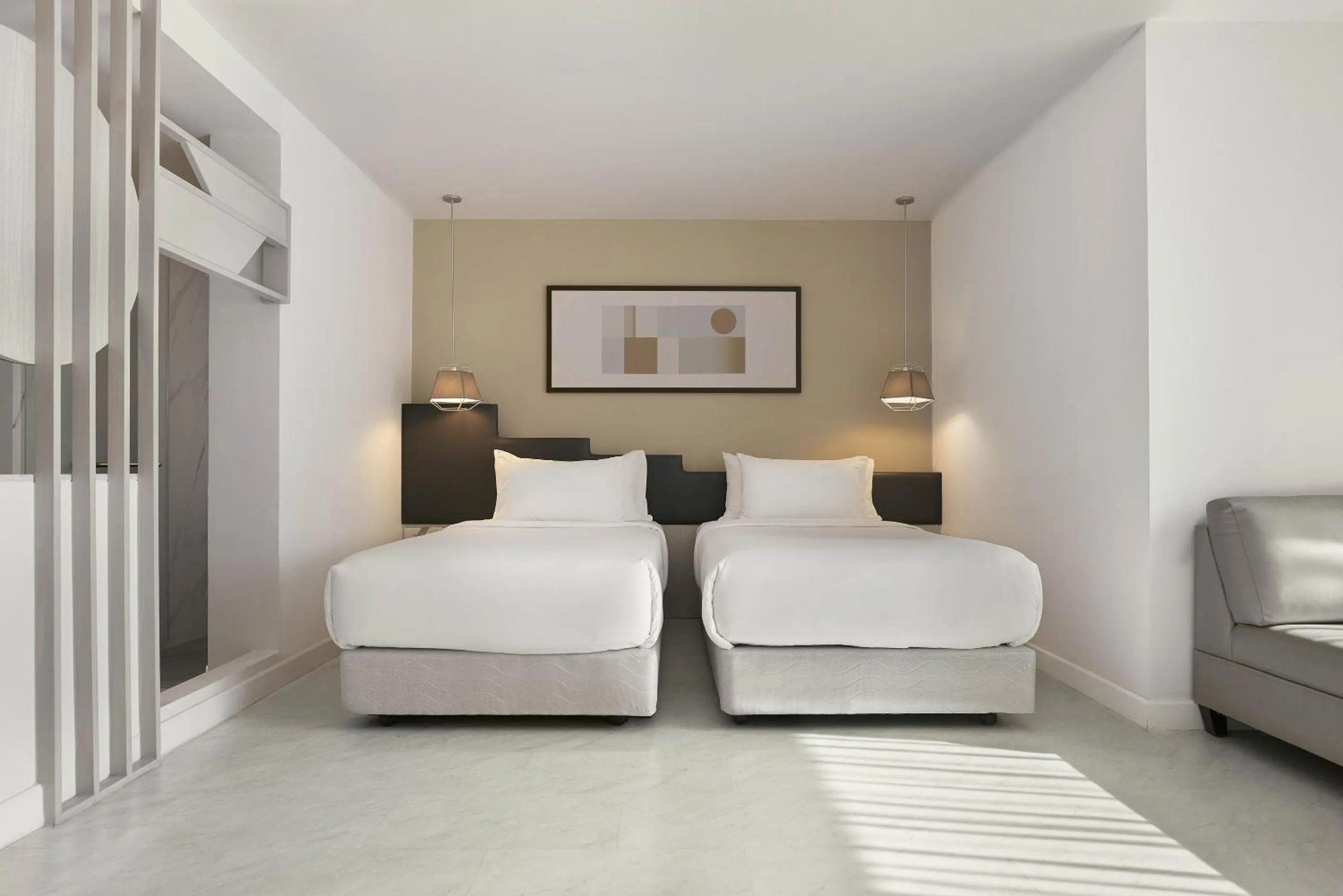 Bed in Livable Hotel Bangkok