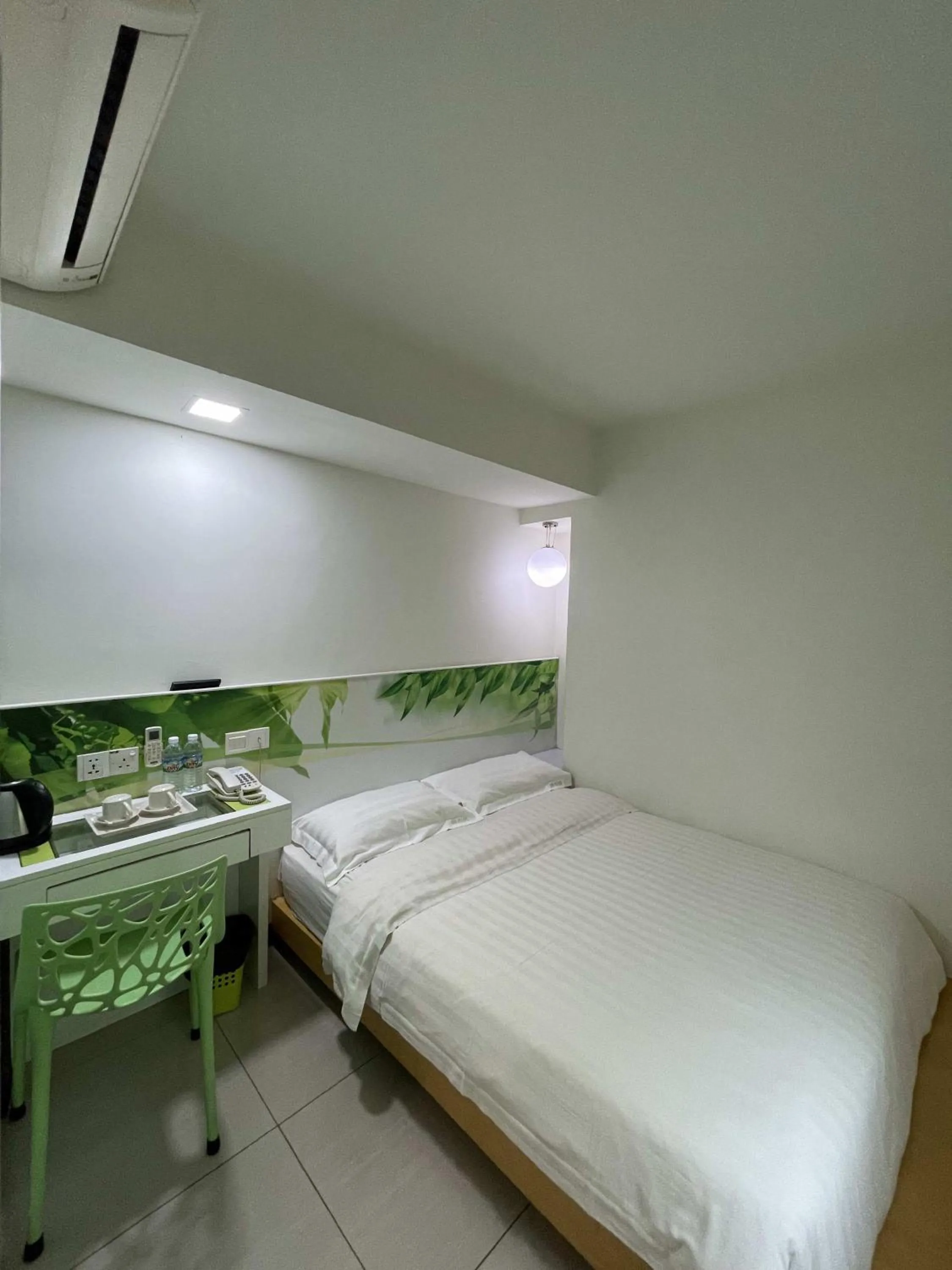 Bed in Green Apple Boutique Hotel