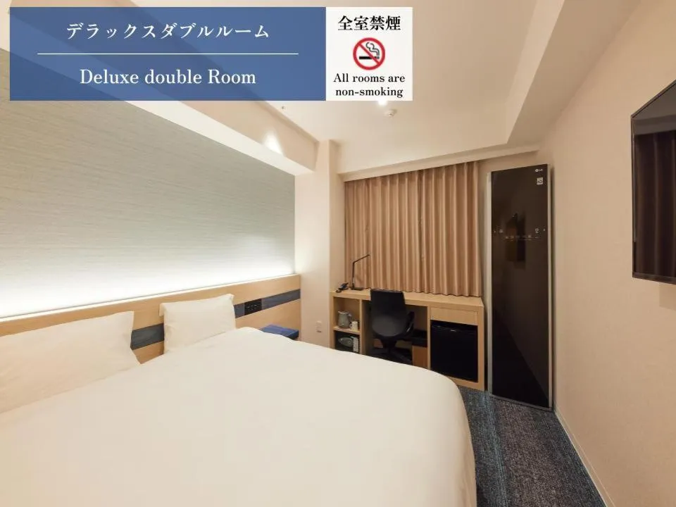 Bed in Henn na Hotel Premier Kagoshima Tenmonkan