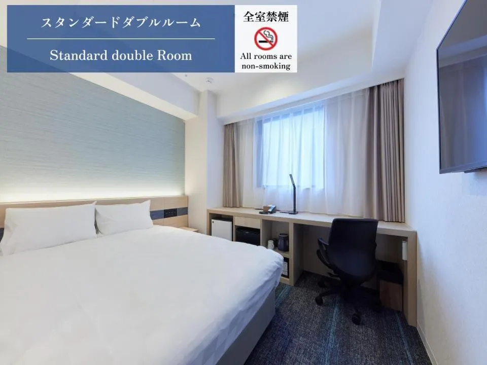 Bed in Henn na Hotel Premier Kagoshima Tenmonkan