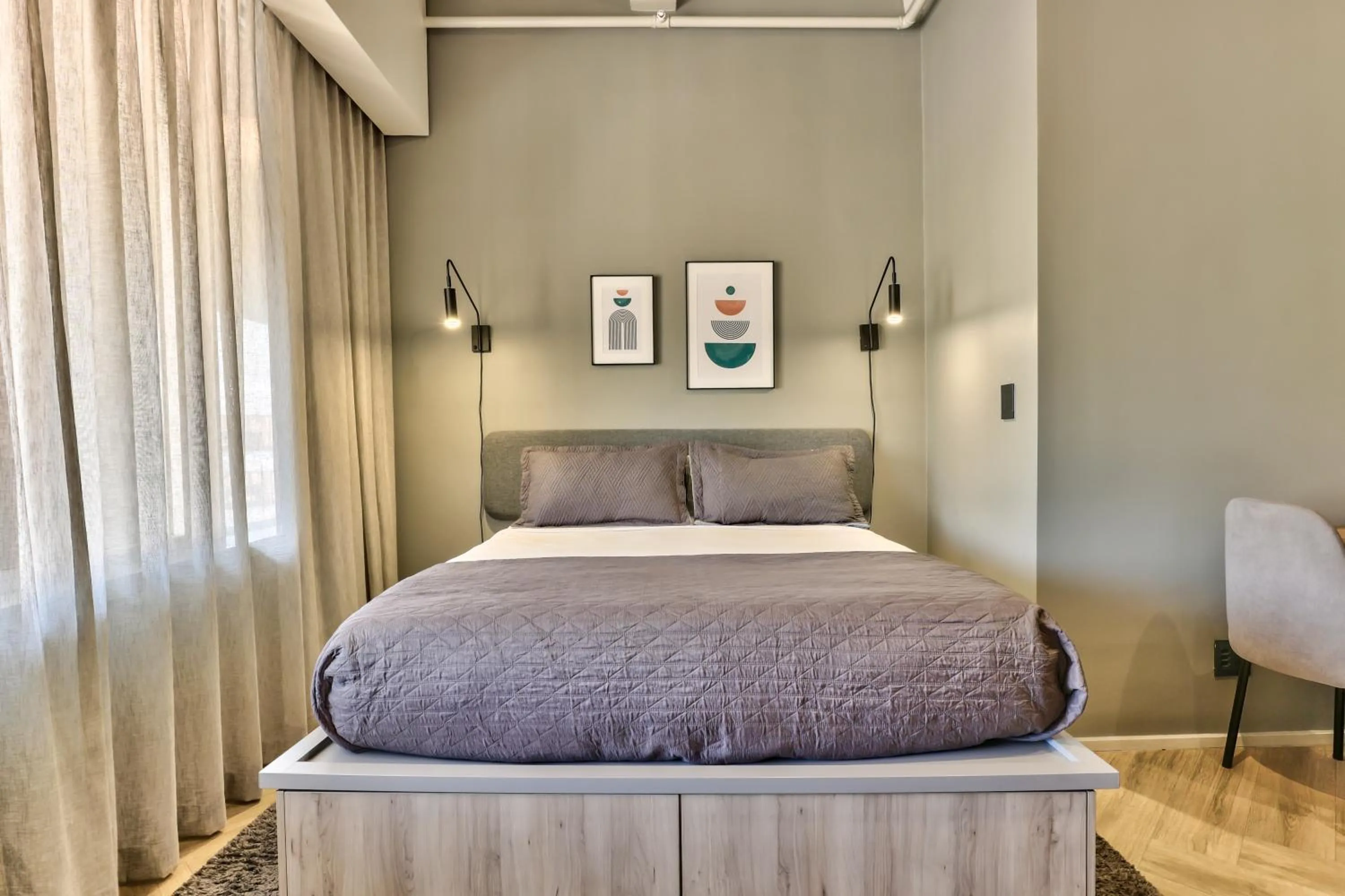 Bed in WINK Aparthotel One Thibault