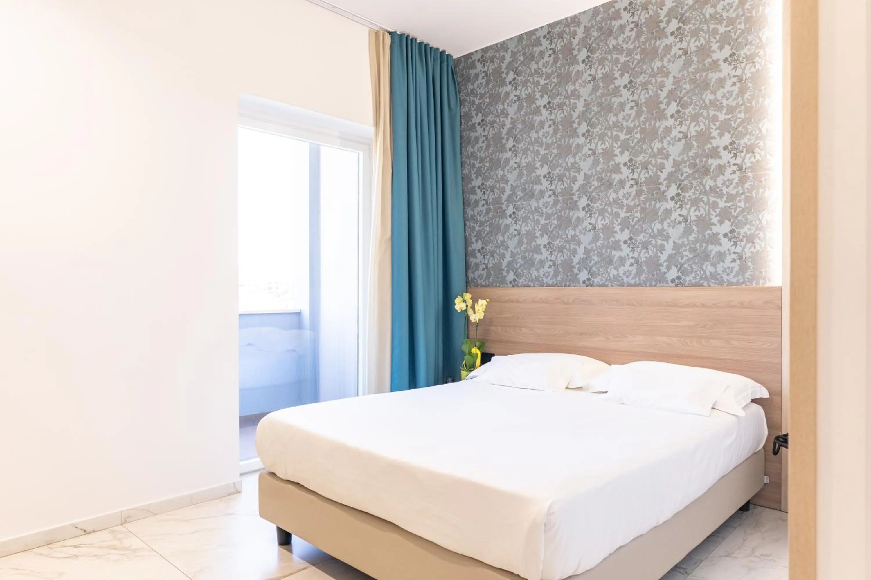 Bed in Hotel Maiuri Pompei