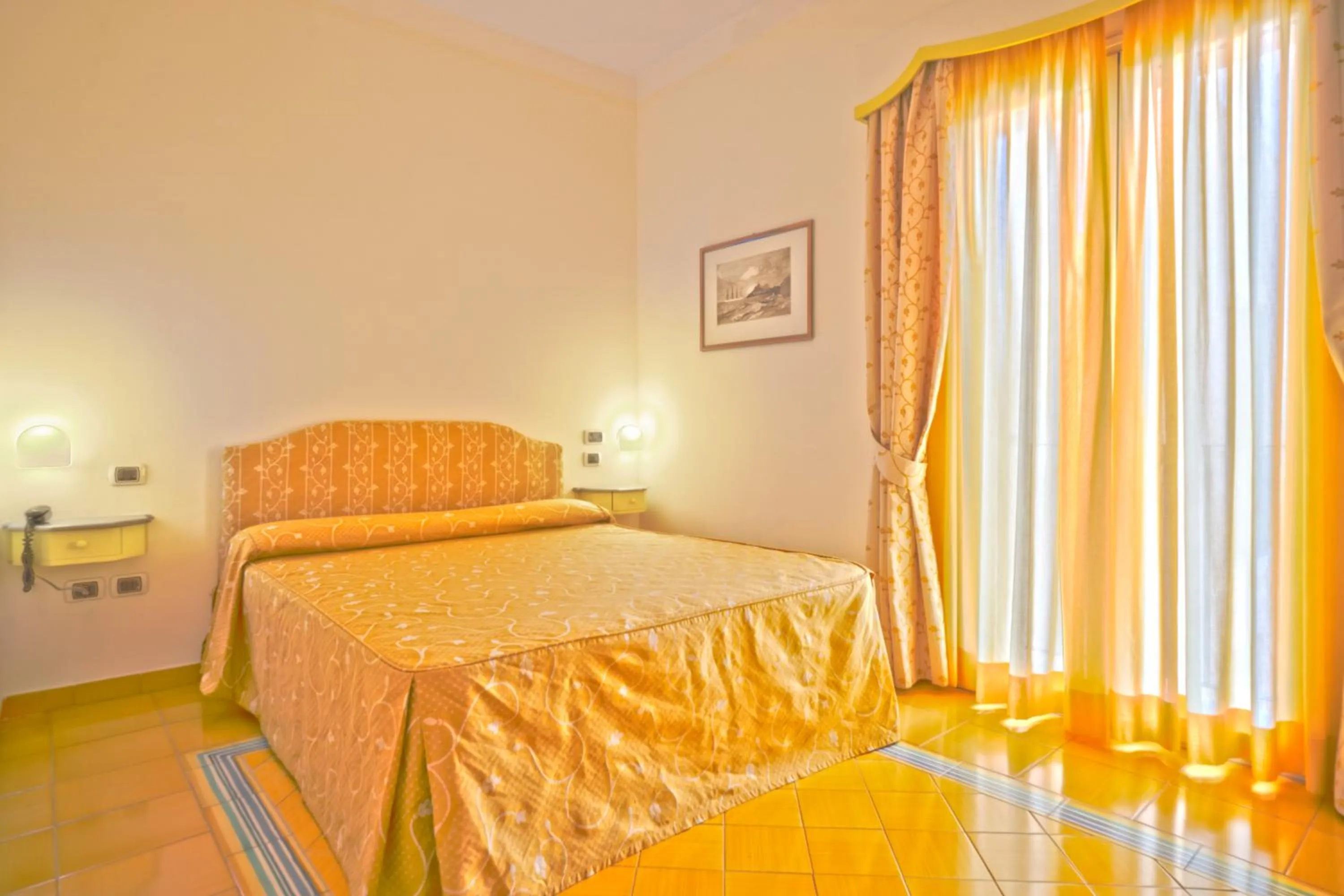 Bed in Hotel Santa Caterina
