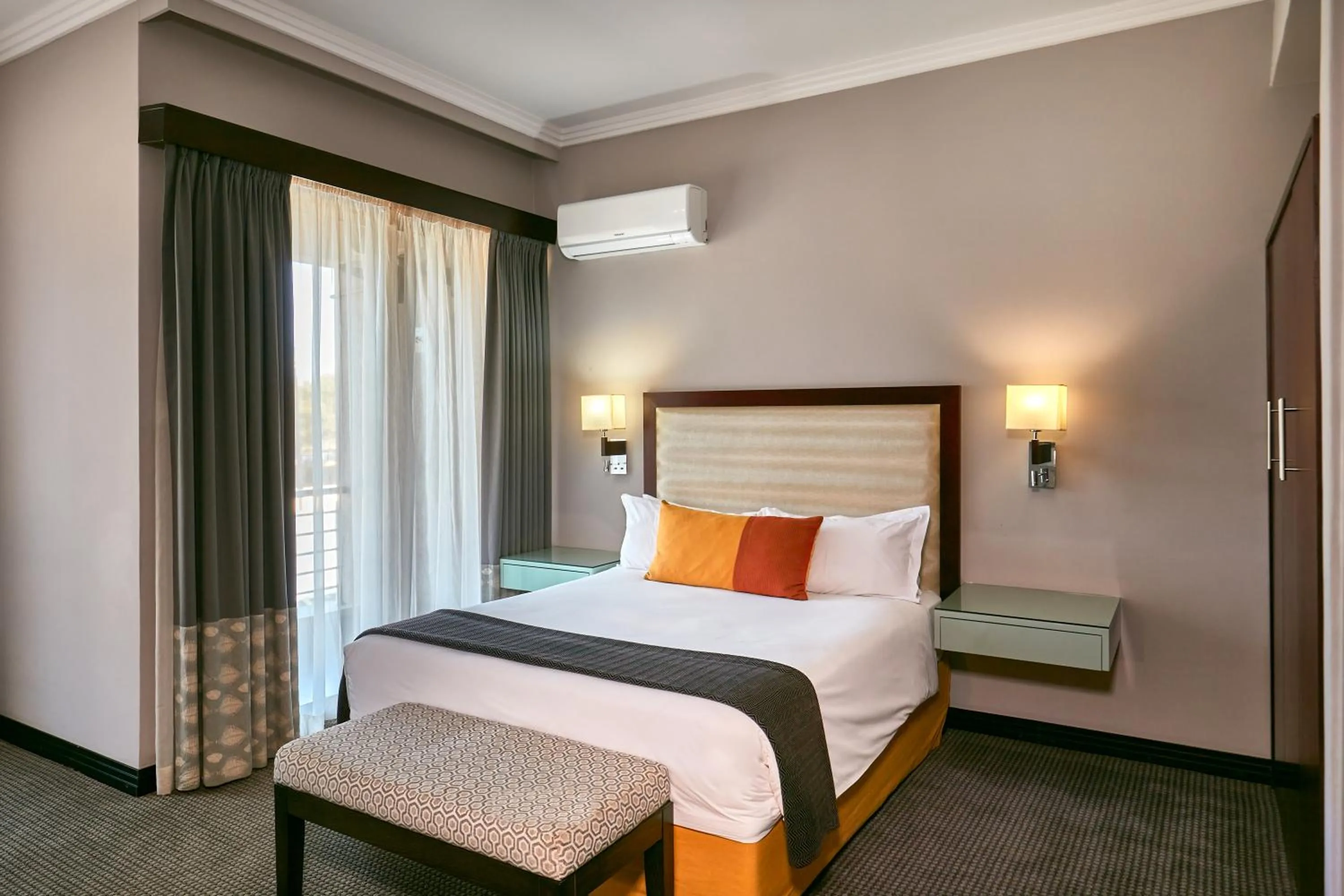 Bed in Regent Select Hotel