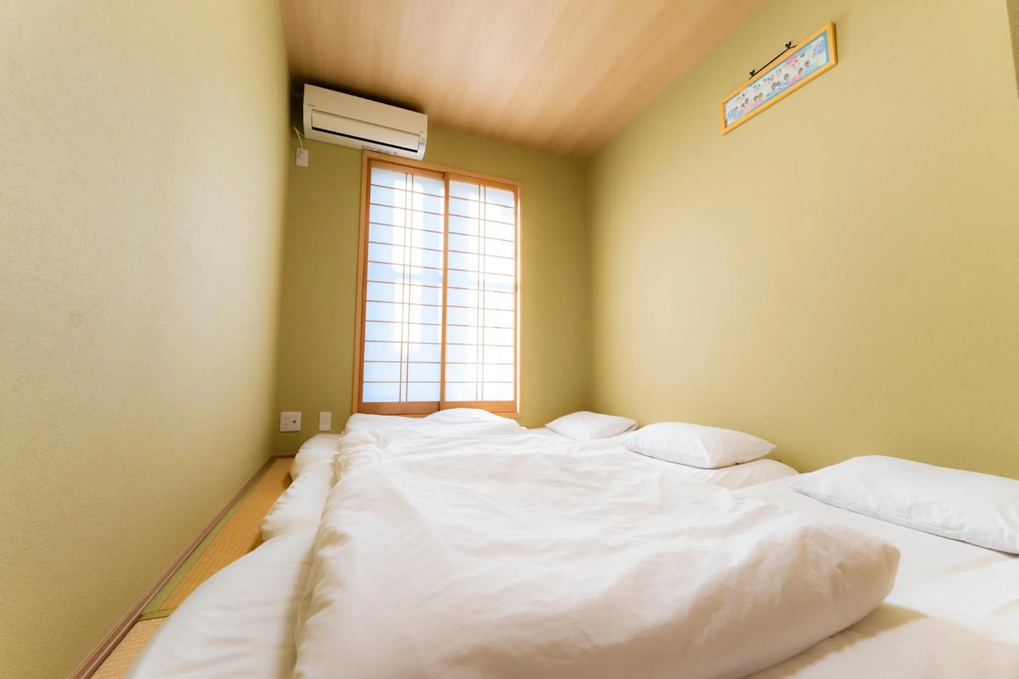 Bedroom, Bed in Bungetsu Shokaku Kaikan