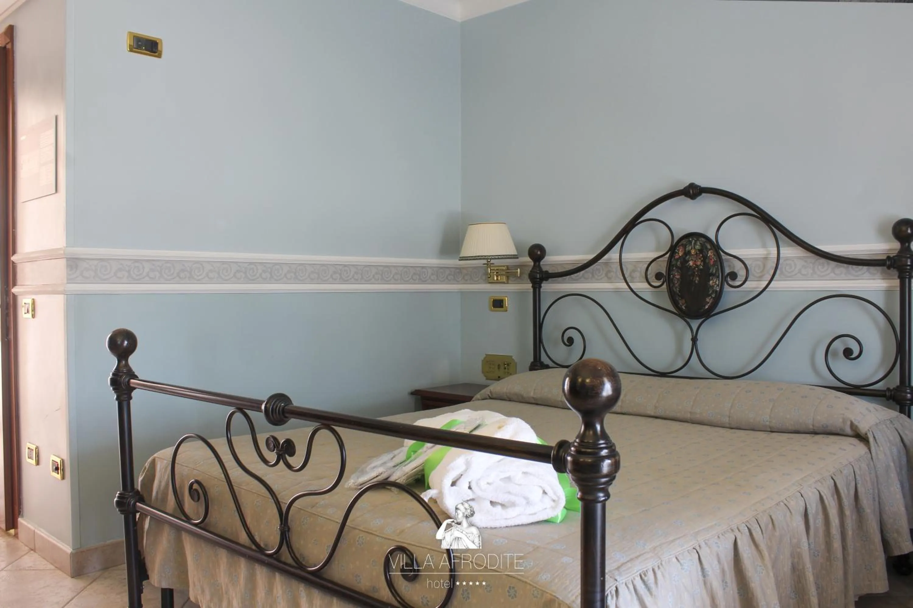 Bed in Afrodite Boutique Hotel