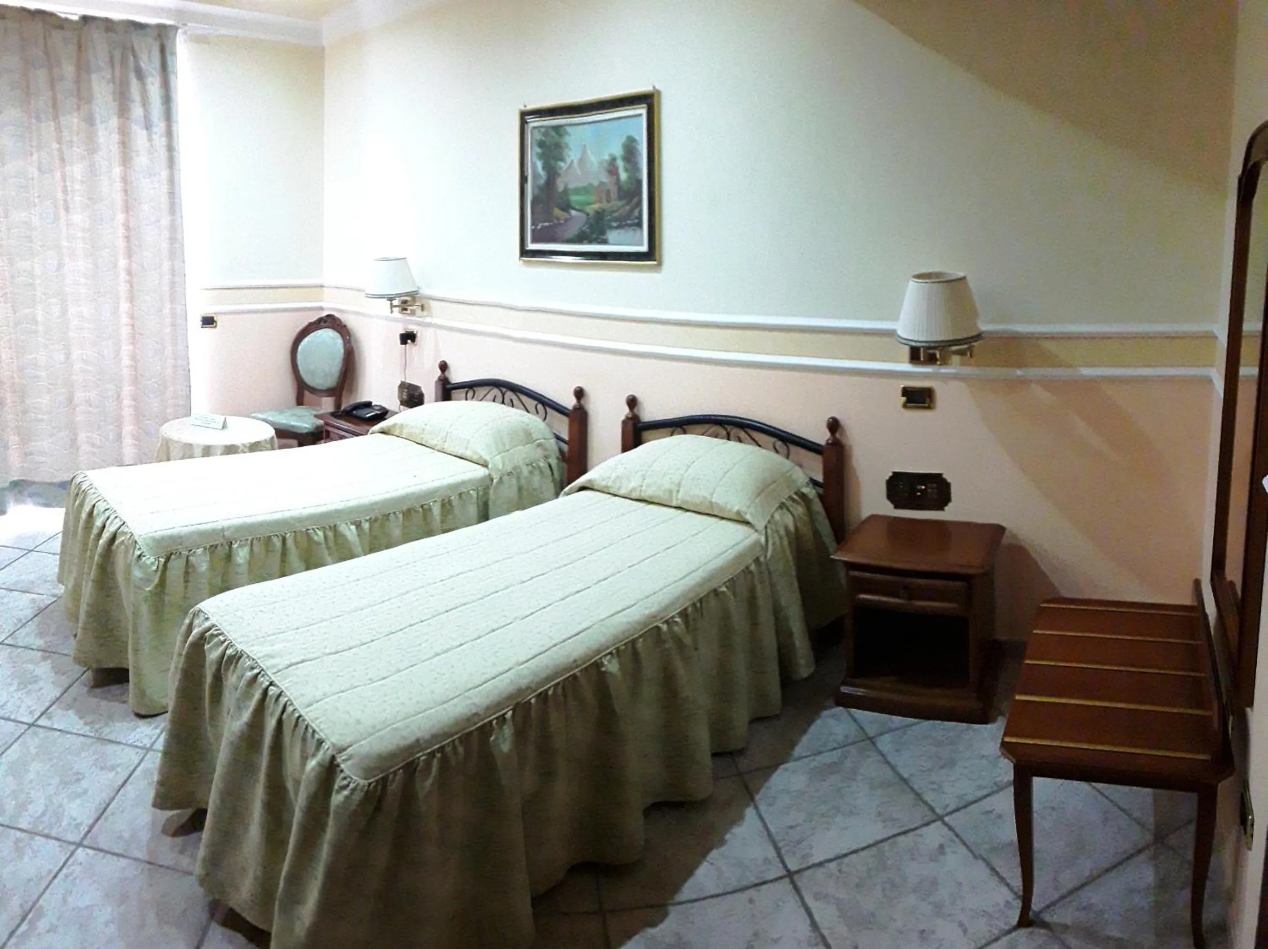 Bed in Afrodite Boutique Hotel