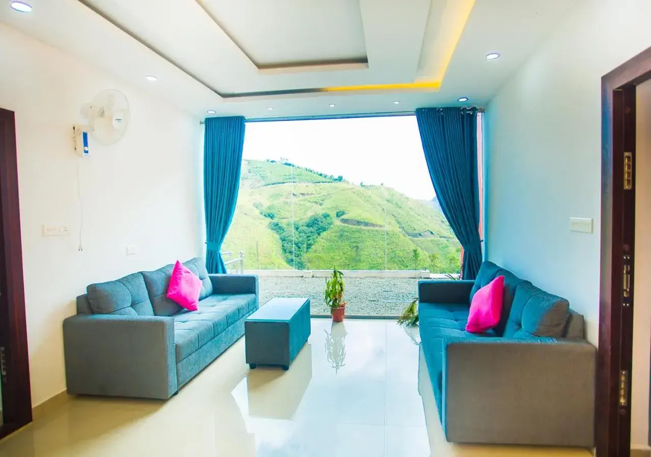 Living room in Hidden Valley Hill View Cottage Vagamon by VOYE HOMES - Rooms with Valley View Living room in Hidden Valley Hill View Cottage Vagamon by VOYE HOMES - Rooms with Valley View