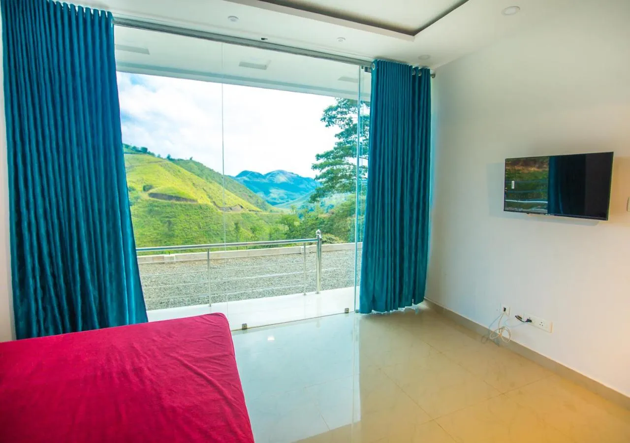 TV and multimedia in Hidden Valley Hill View Cottage Vagamon by VOYE HOMES - Rooms with Valley View