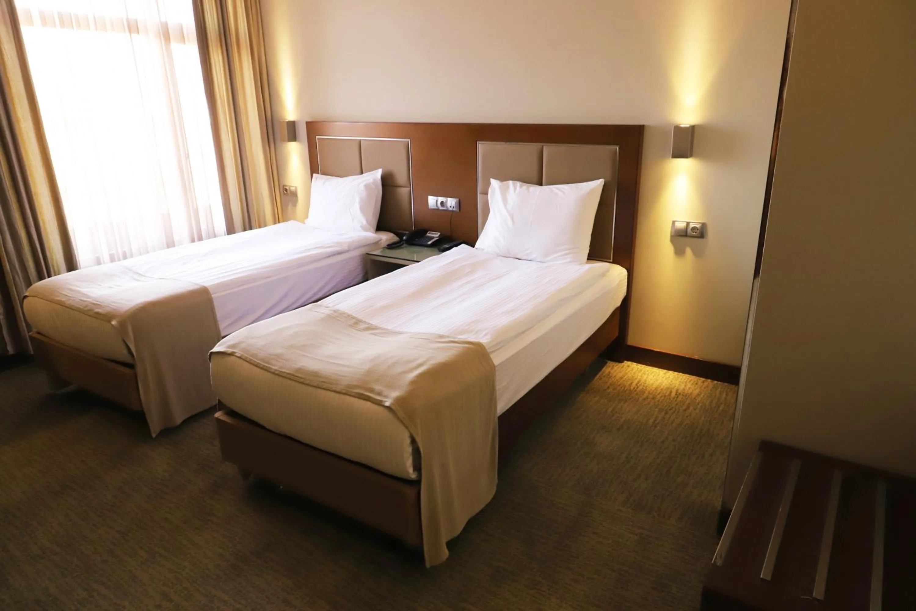Bed in HİTİT OTEL