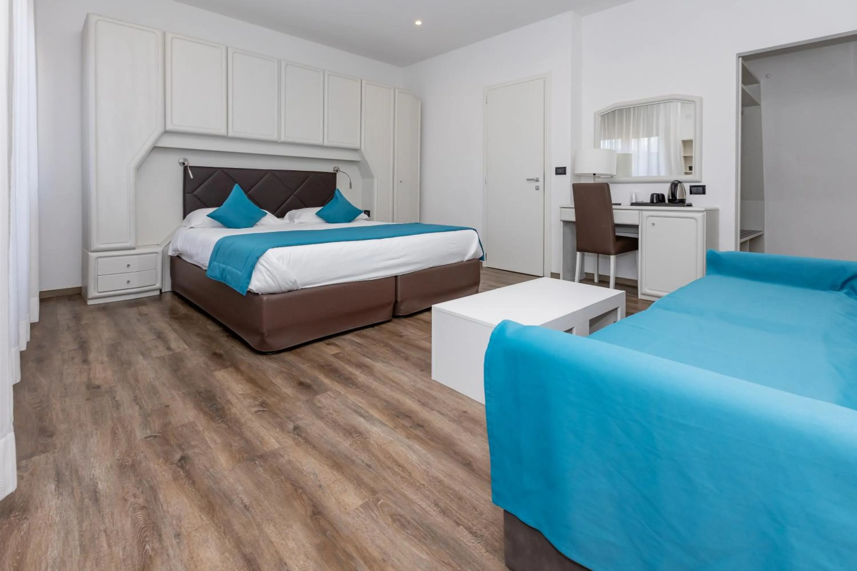 Bed in Albergo Cappello e Cadore