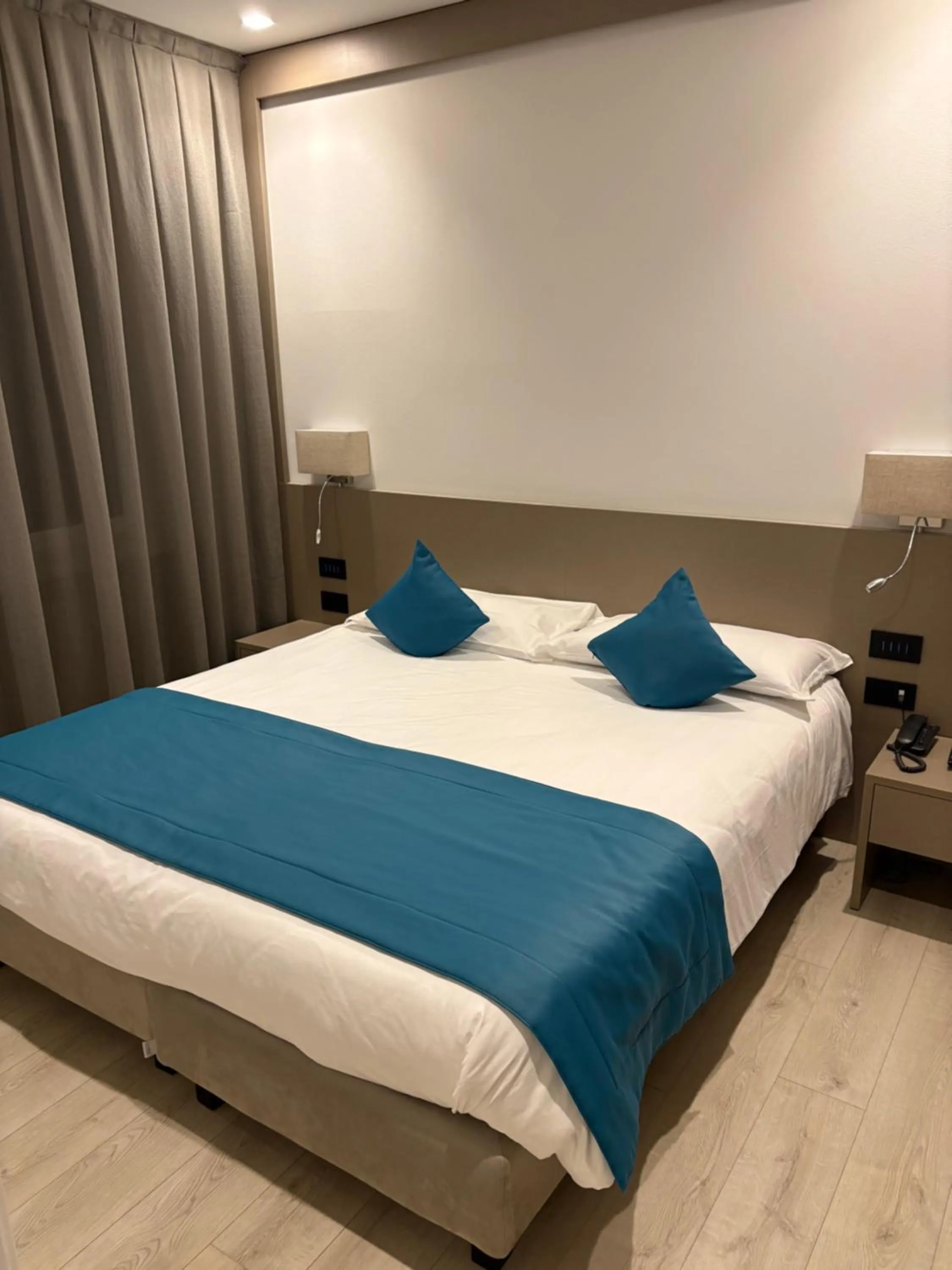 Bed in Albergo Cappello e Cadore