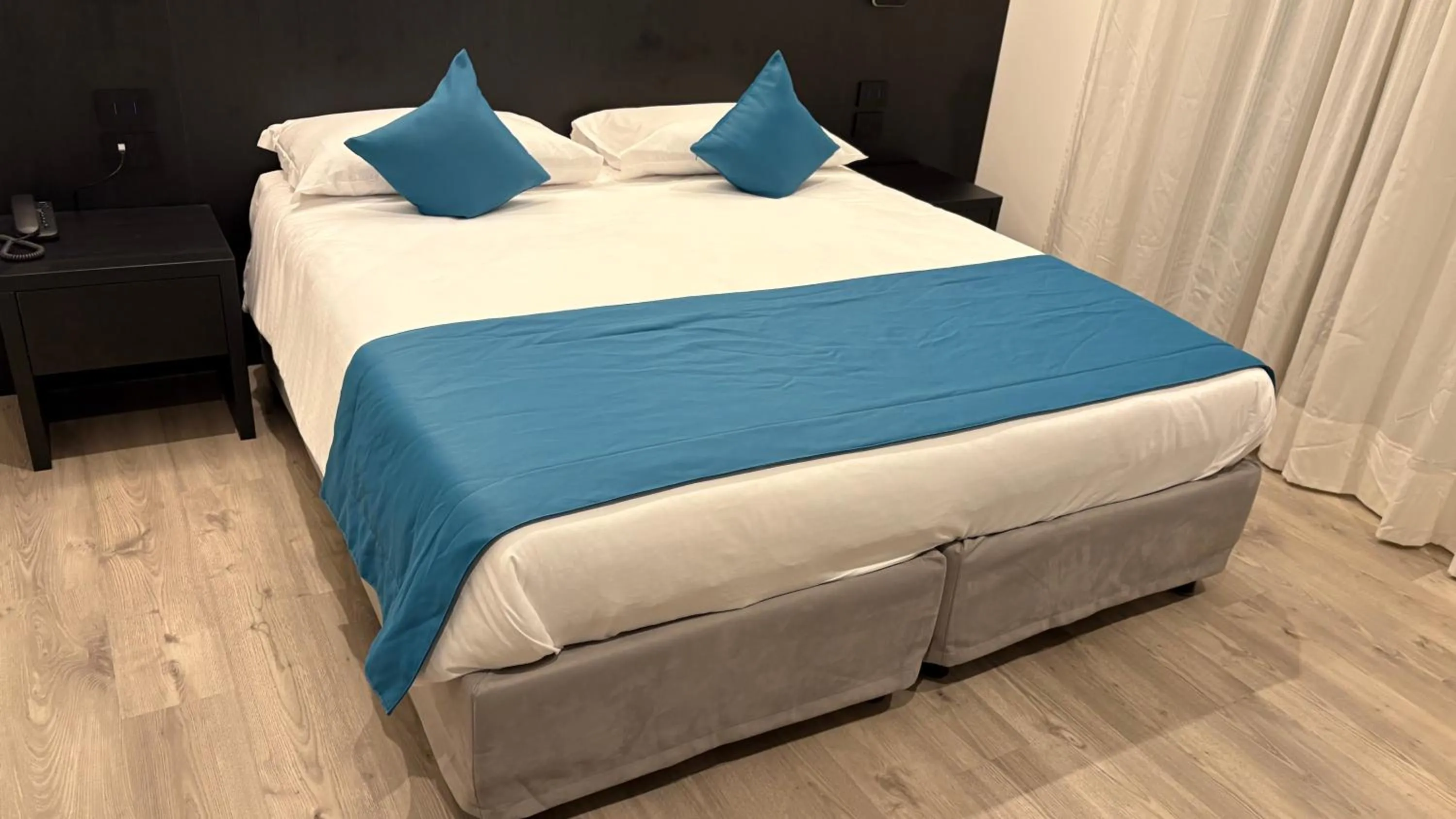 Bed in Albergo Cappello e Cadore