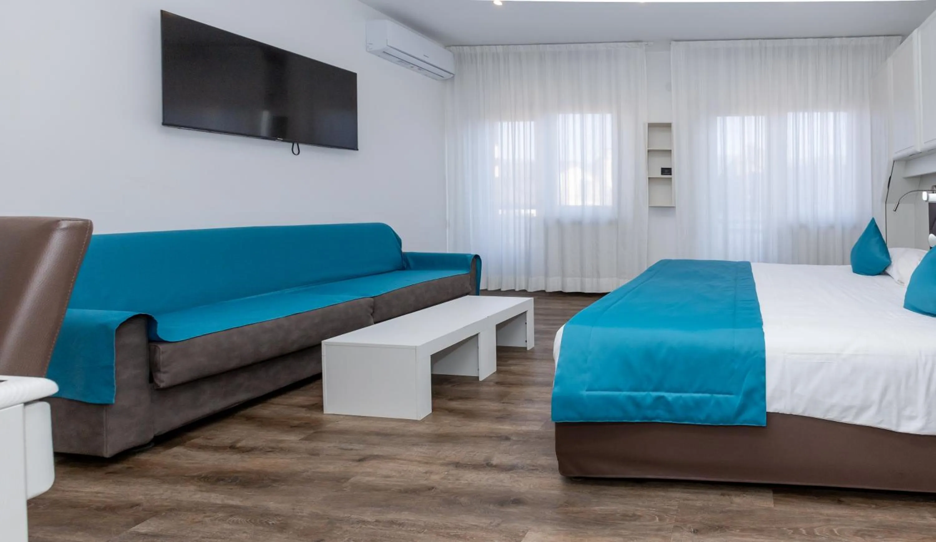 Bed in Albergo Cappello e Cadore