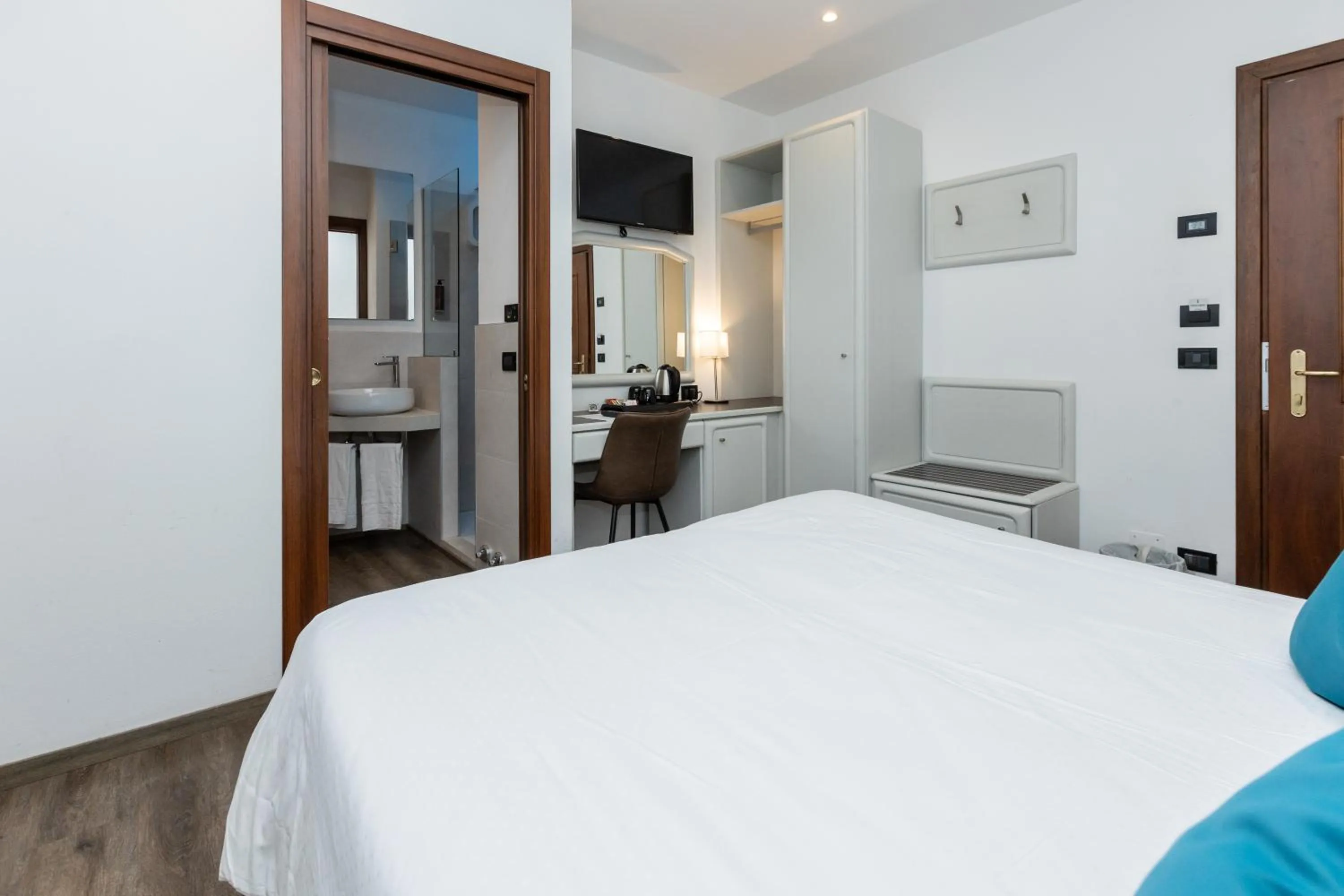 Bed in Albergo Cappello e Cadore