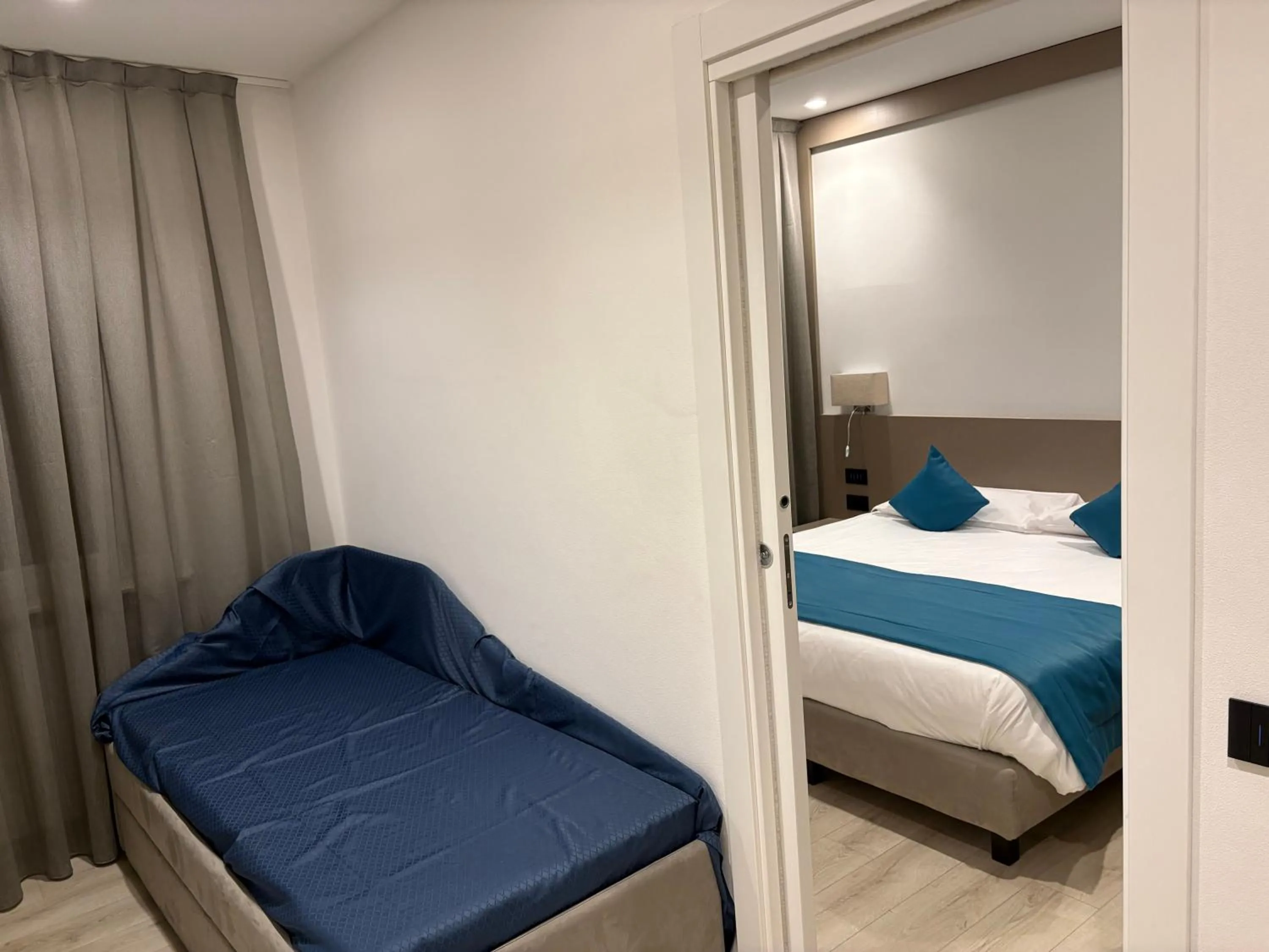 Bed in Albergo Cappello e Cadore