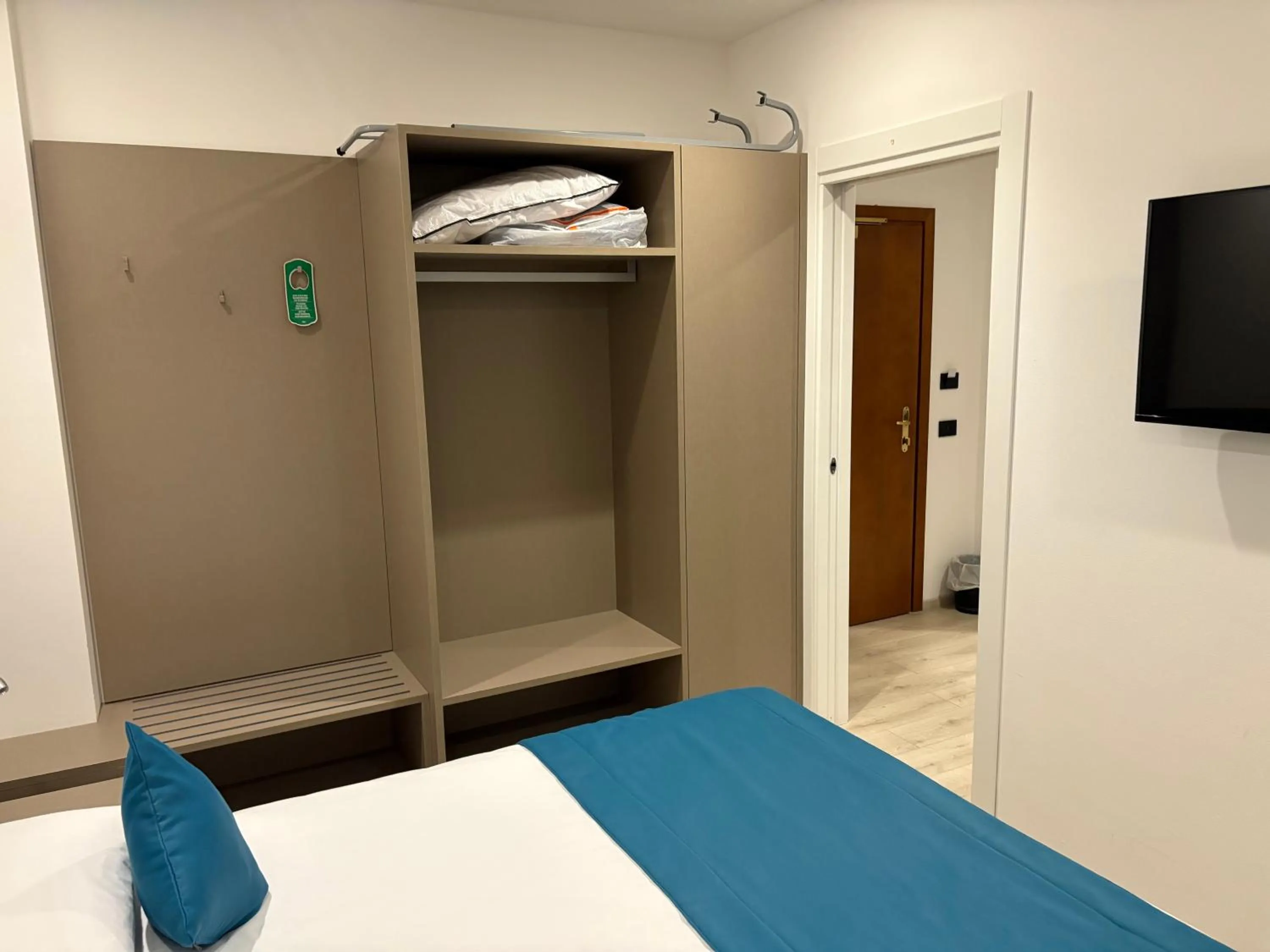 Bed in Albergo Cappello e Cadore