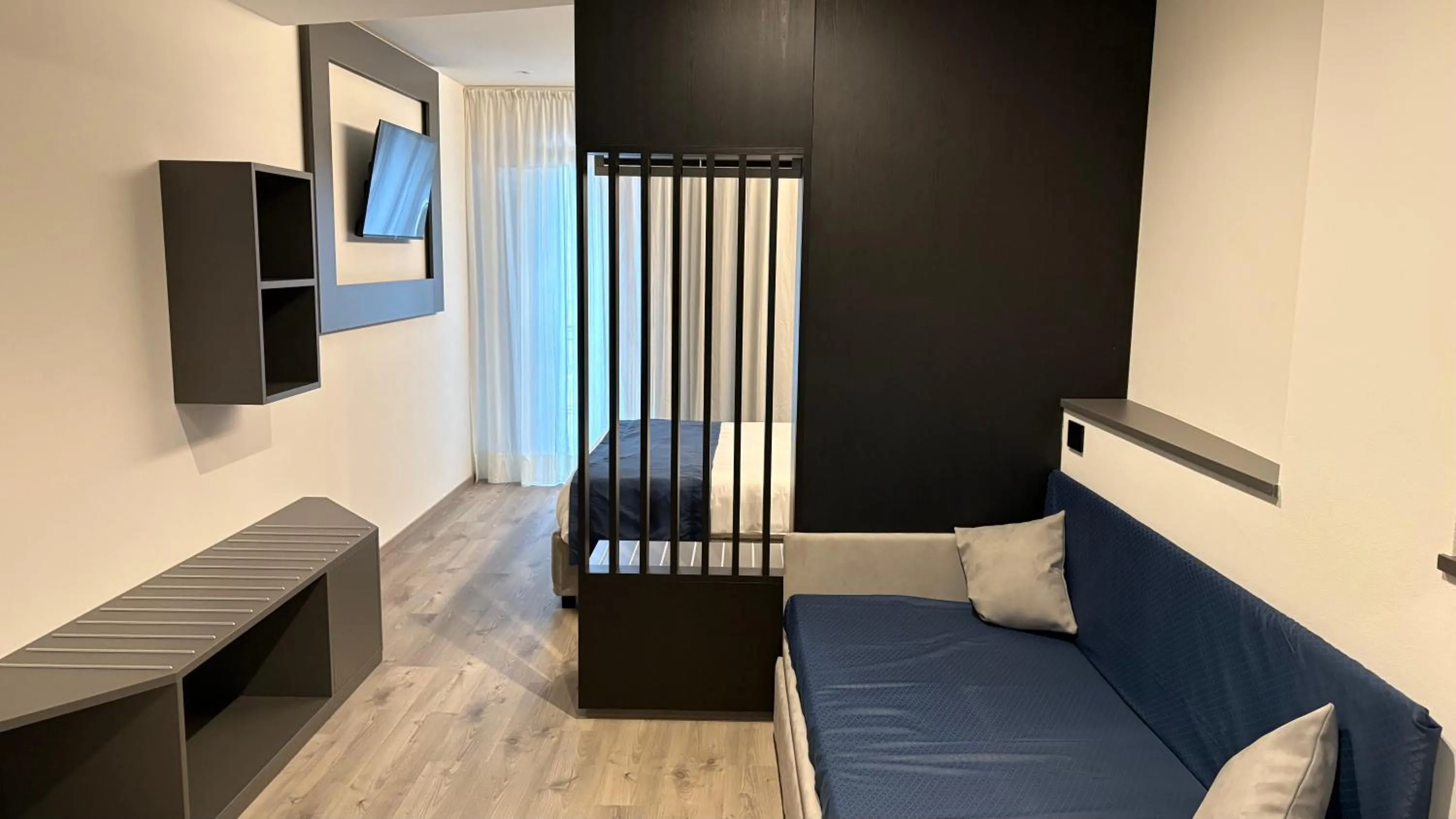 Bed in Albergo Cappello e Cadore