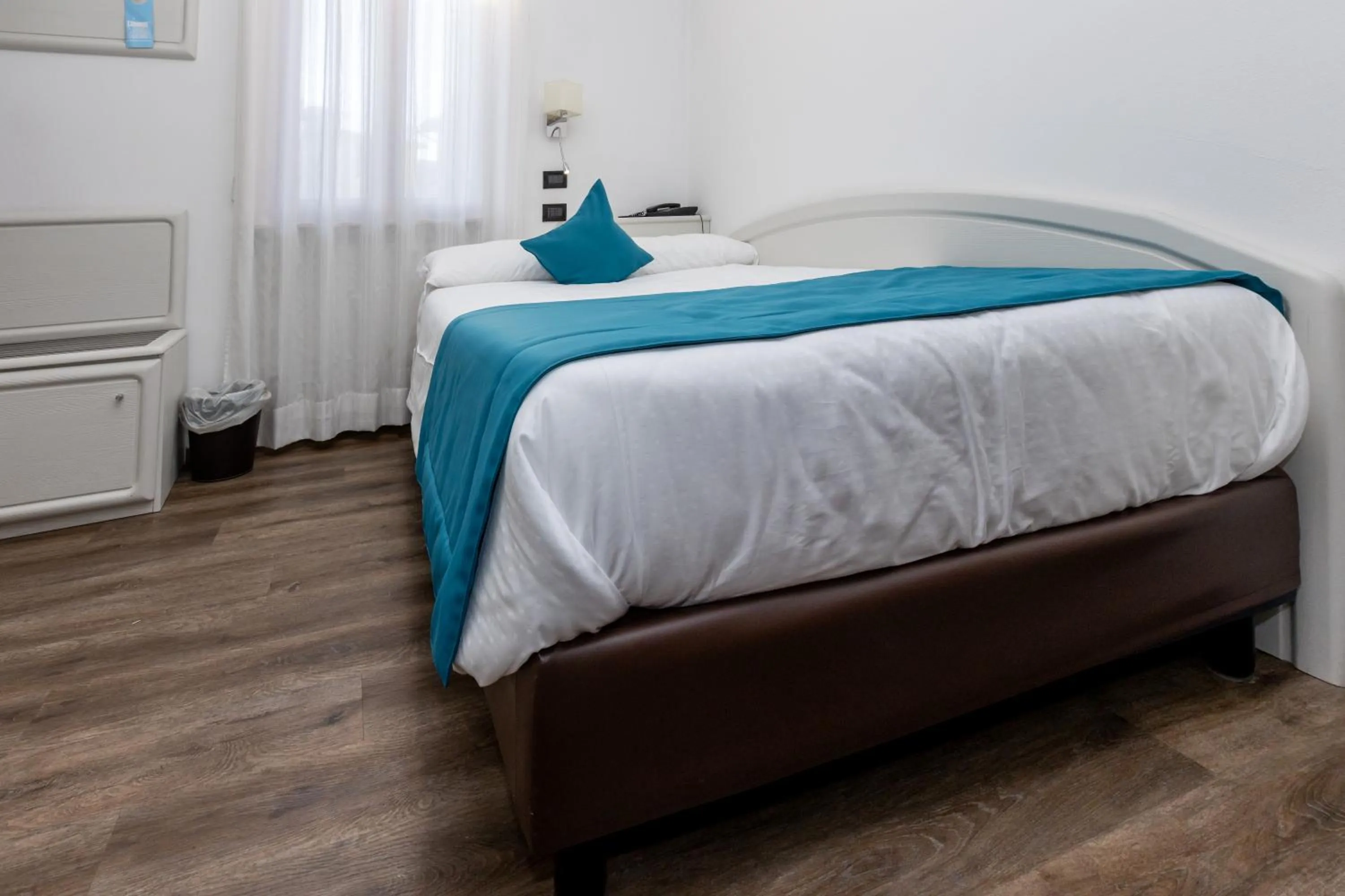 Bed in Albergo Cappello e Cadore