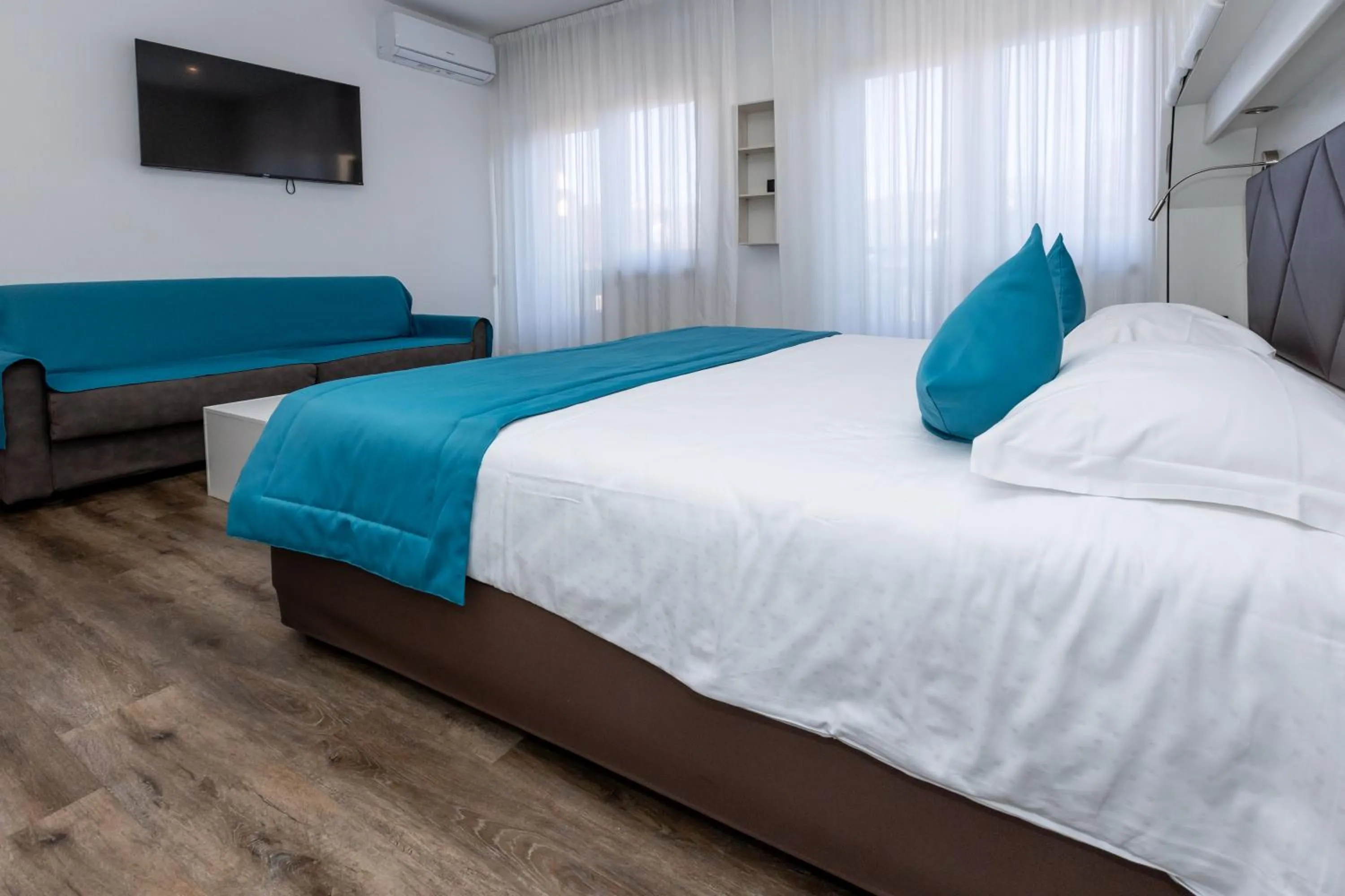 Bed in Albergo Cappello e Cadore