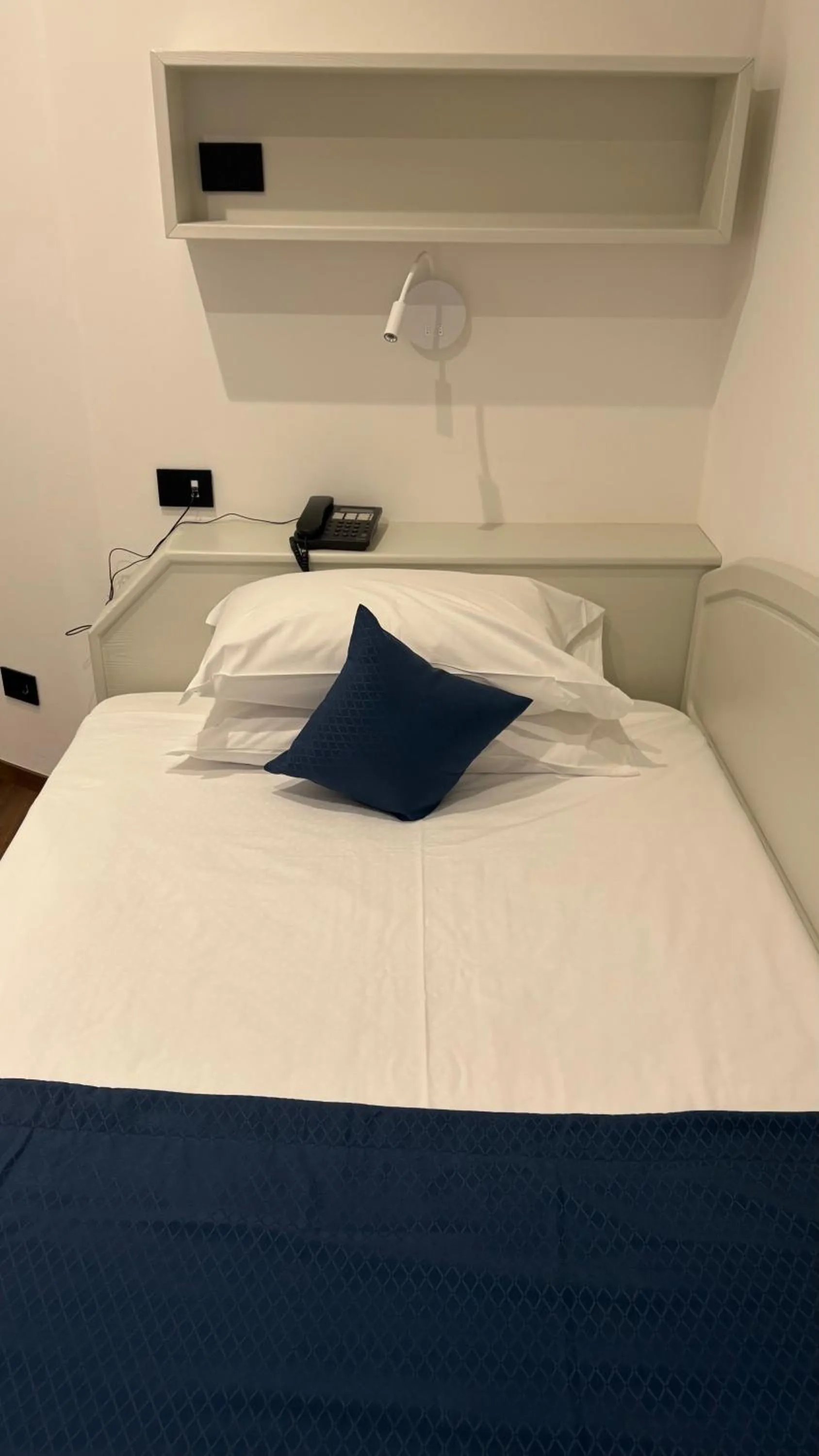 Bed in Albergo Cappello e Cadore