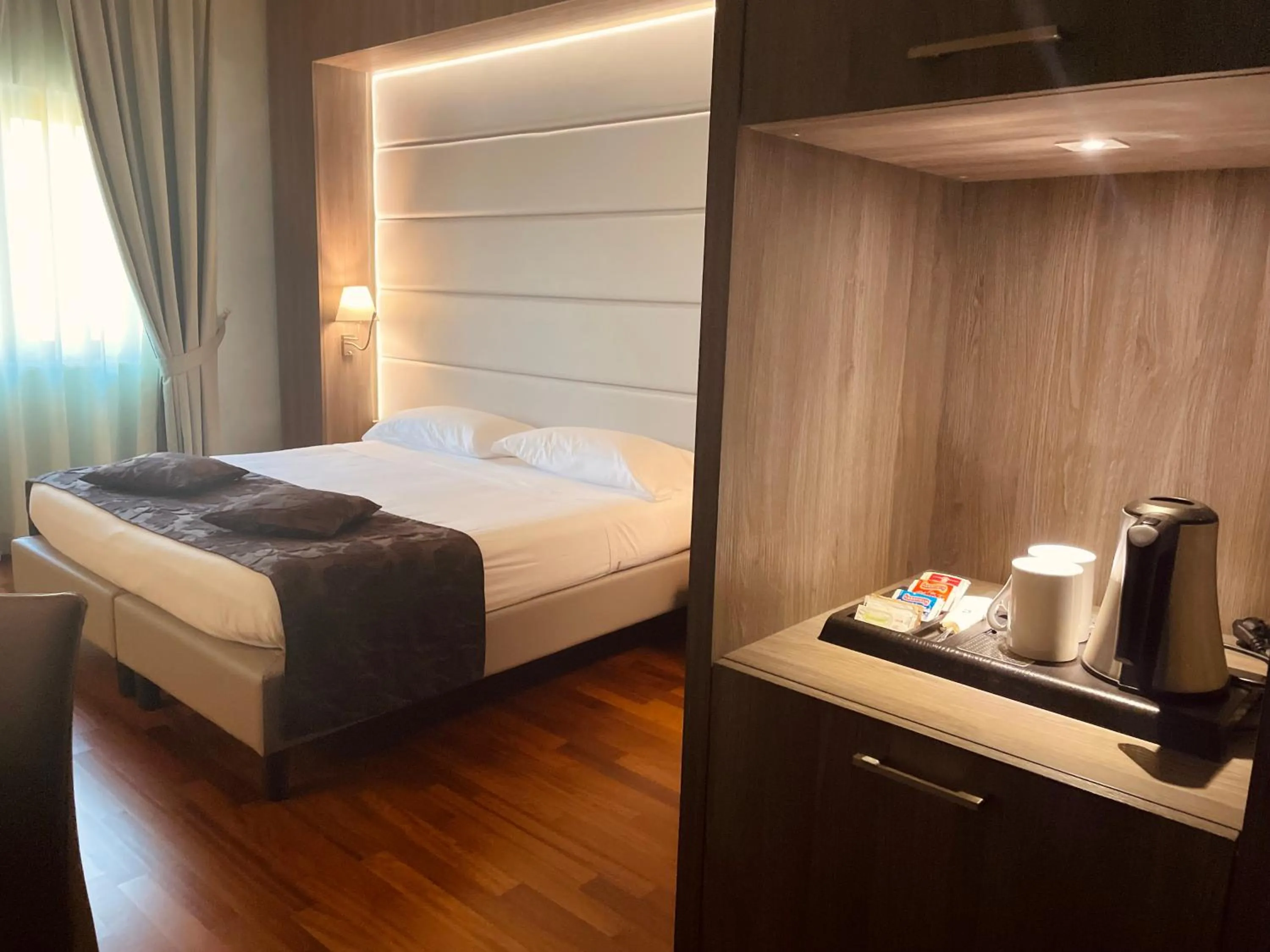 Bed in Hotel Santacroce Meeting