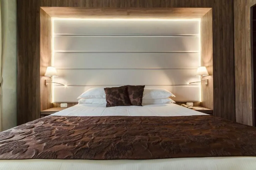 Bed in Hotel Santacroce Meeting