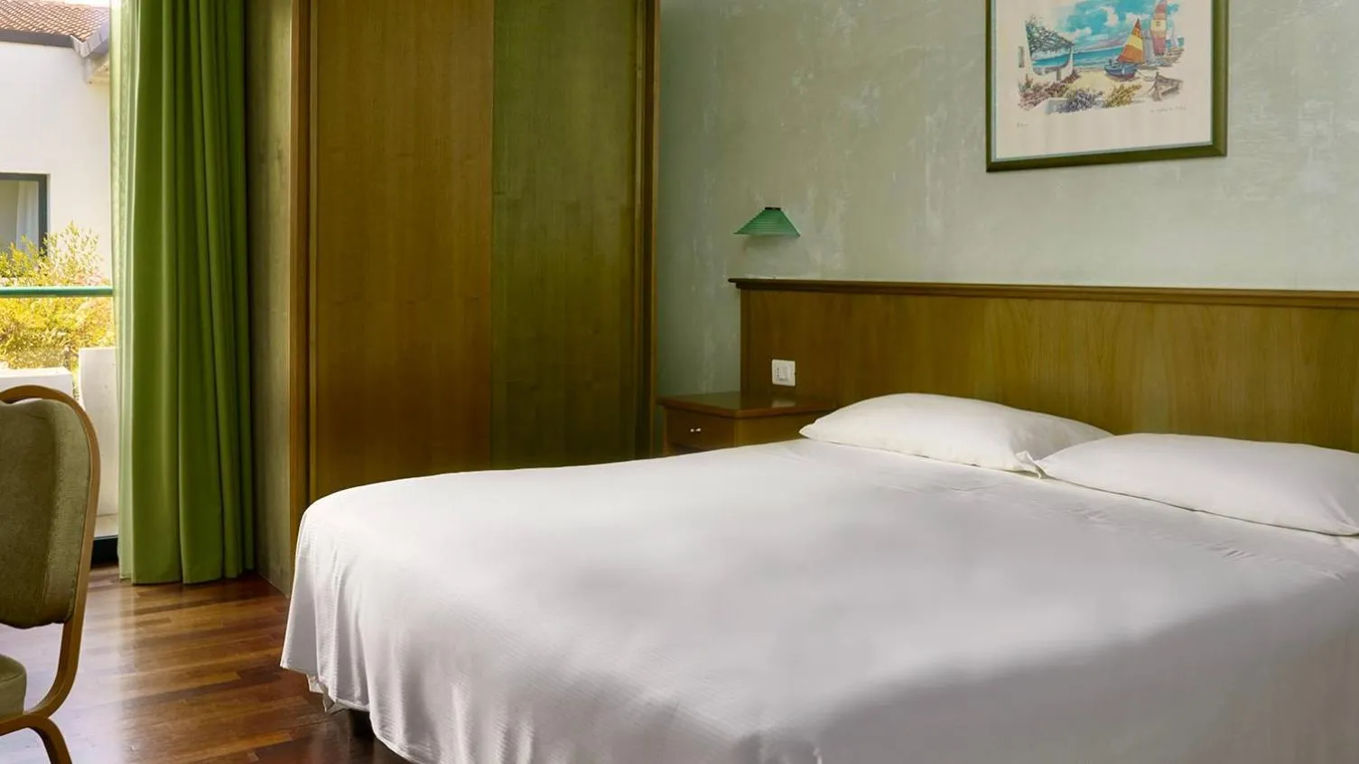 Bed in Hotel Santacroce Meeting