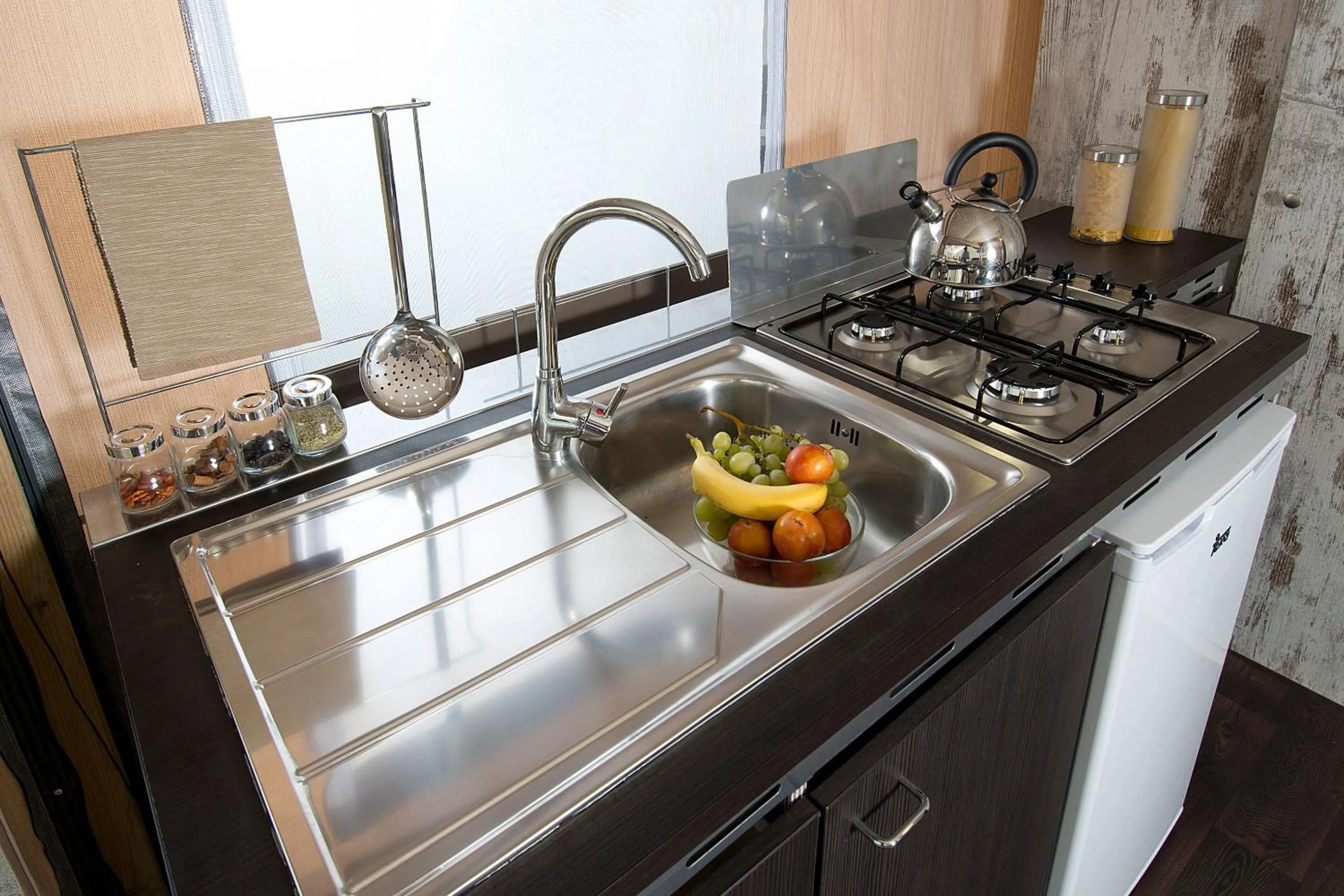 Kitchen or kitchenette in Camping Village Rocchette