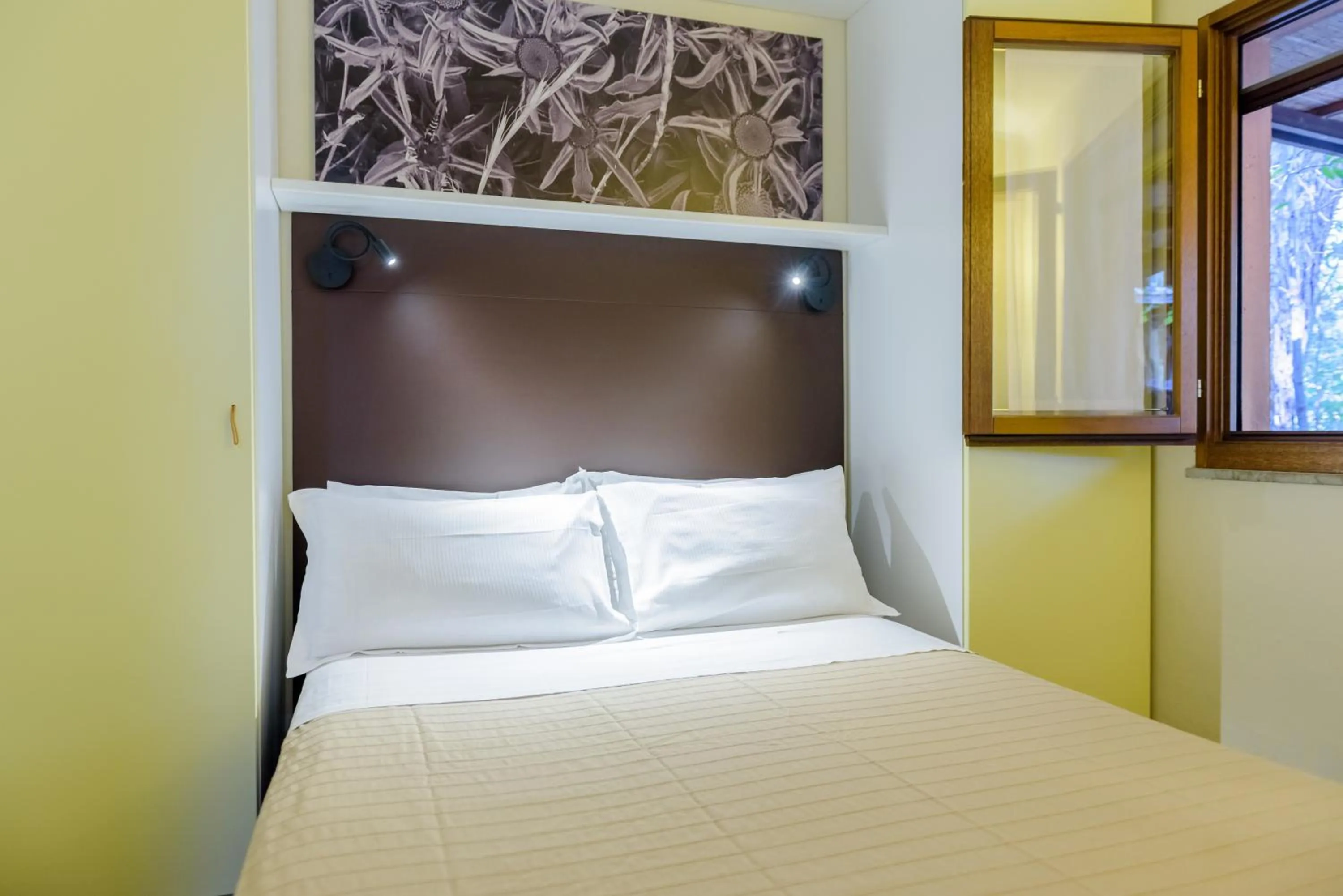 Bedroom in Camping Village Rocchette