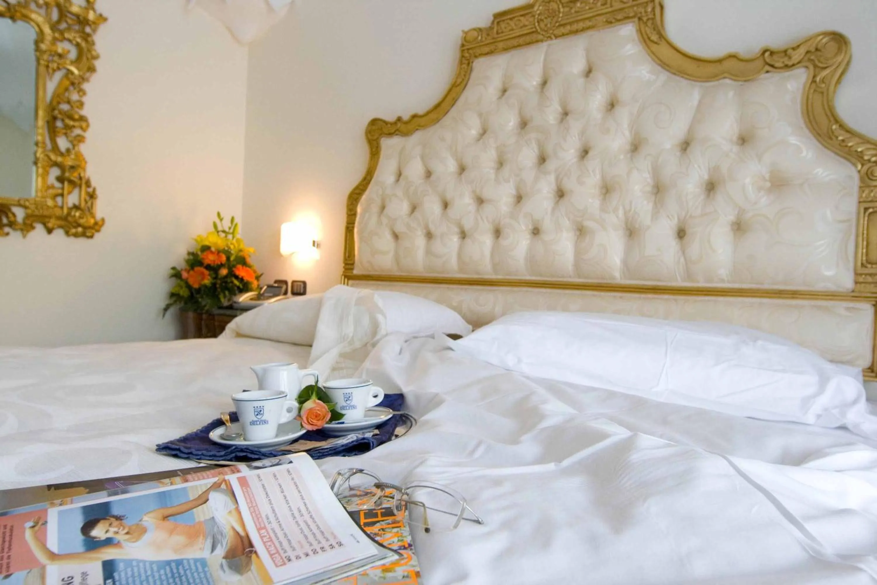 Bed in Strand Hotel Delfini