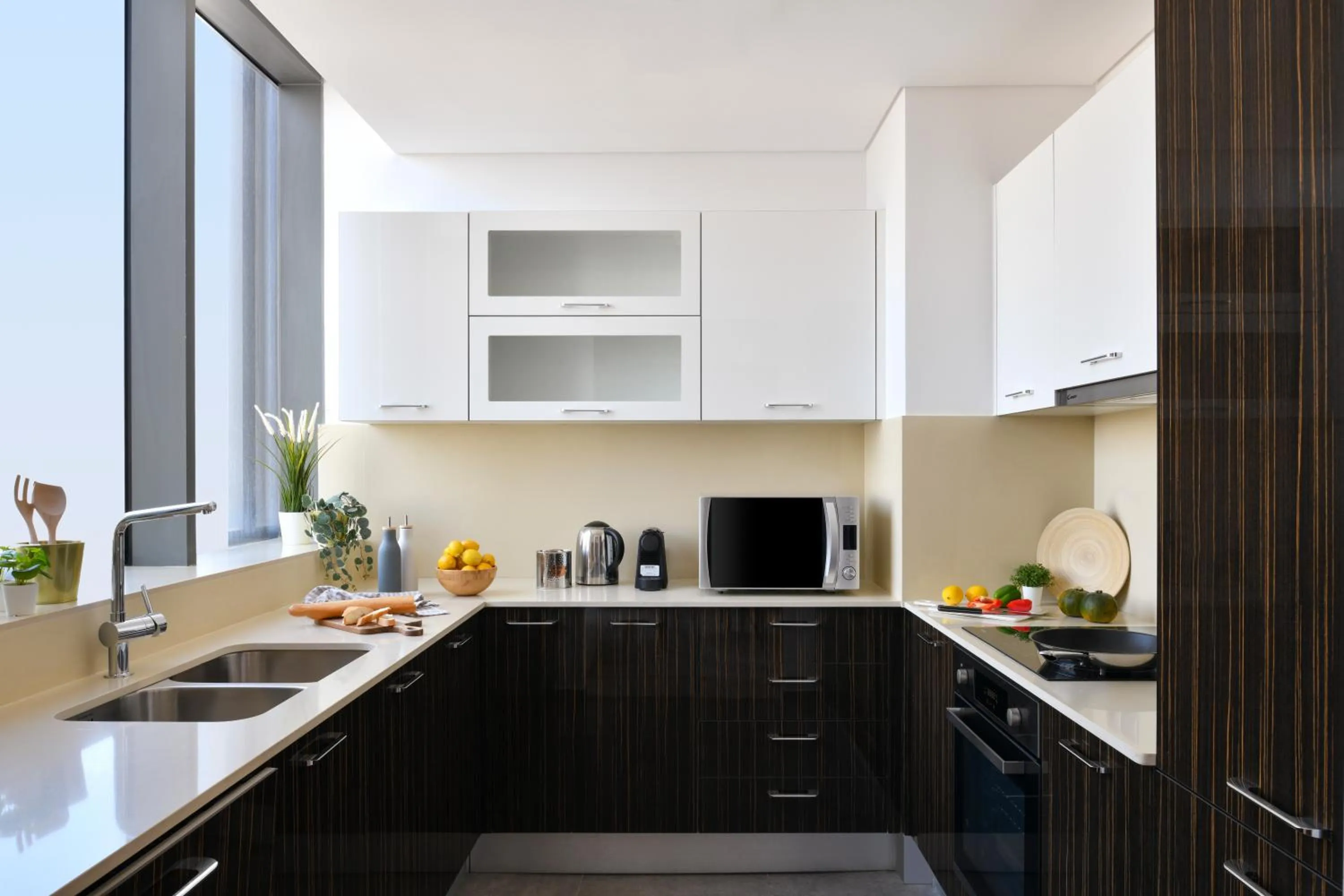 Kitchen or kitchenette in Le Mirage Downtown