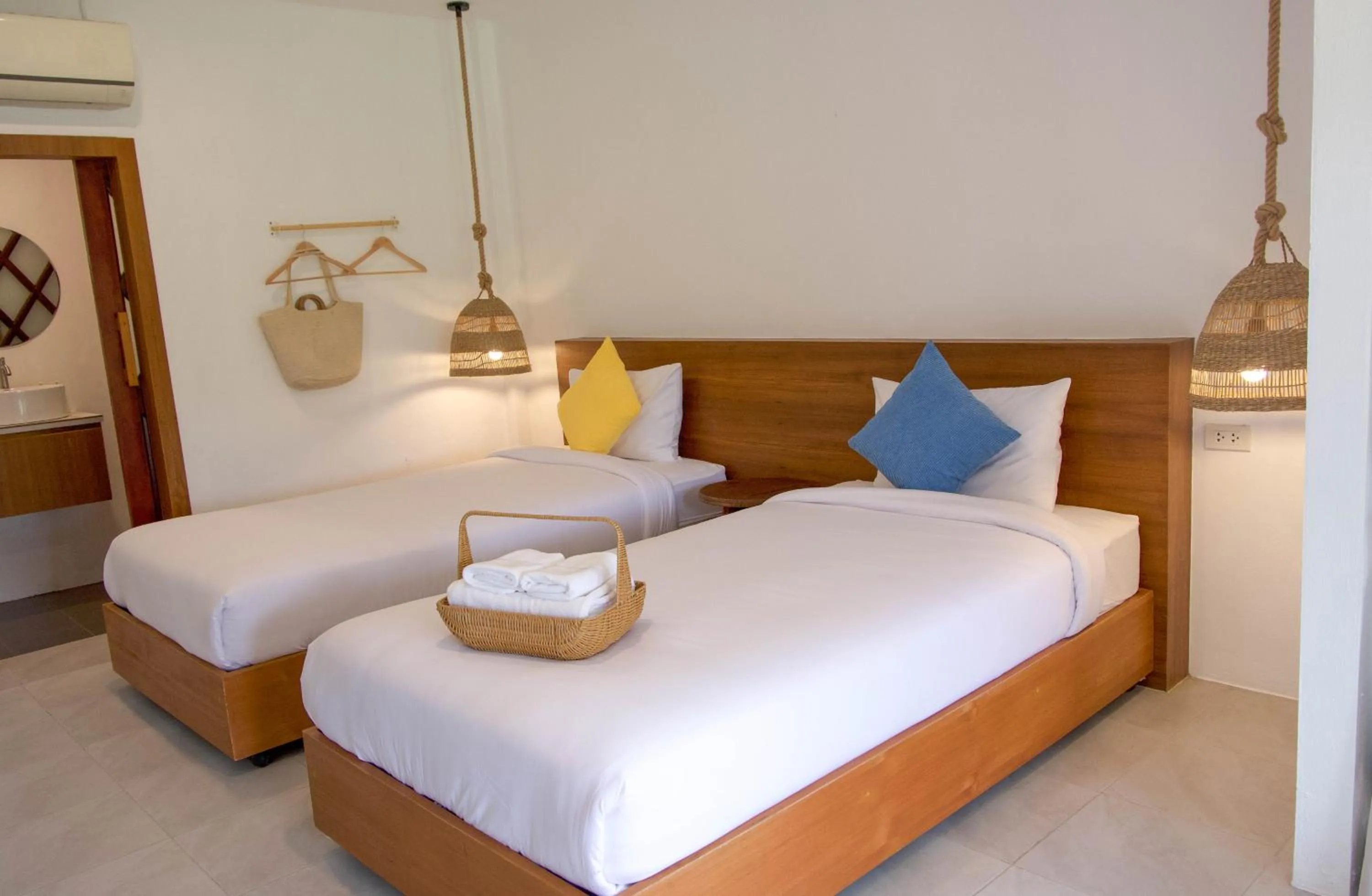 Bed in Issara Beach Resort Beachfront