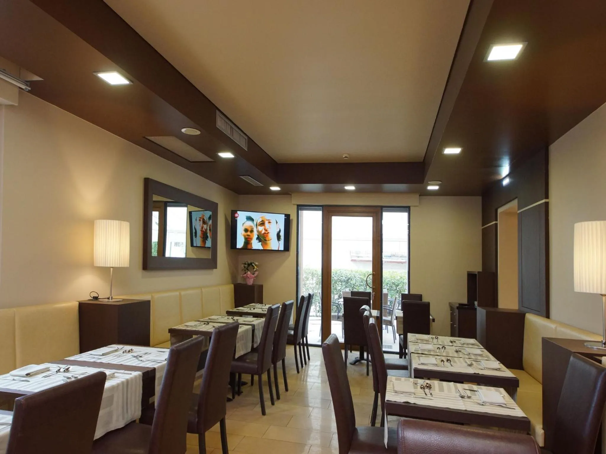 Communal lounge/ TV room in Hotel Clarin 14 by Dori