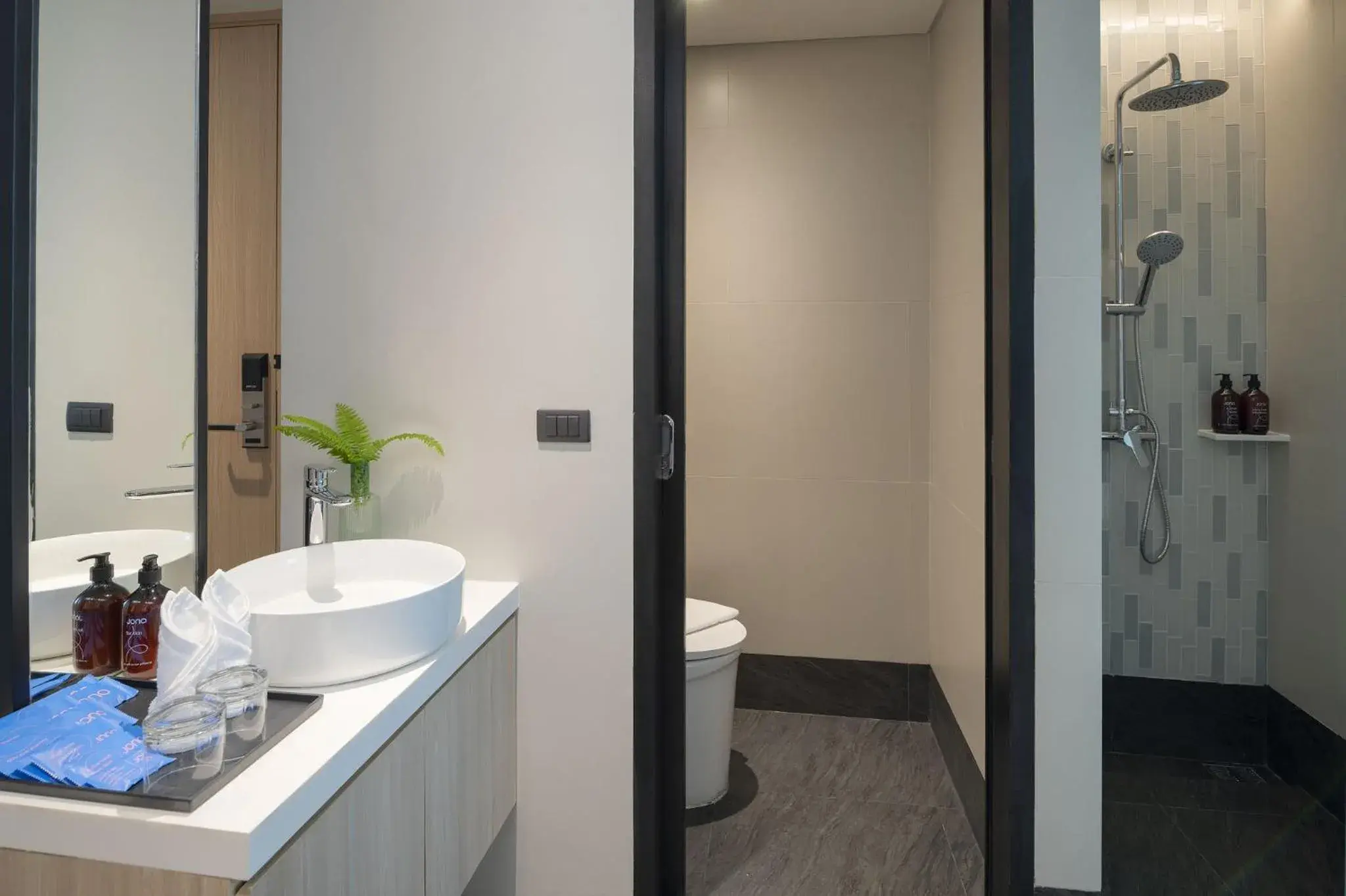 Bathroom in JonoX Phuket Karon Hotel Bathroom in JonoX Phuket Karon Hotel